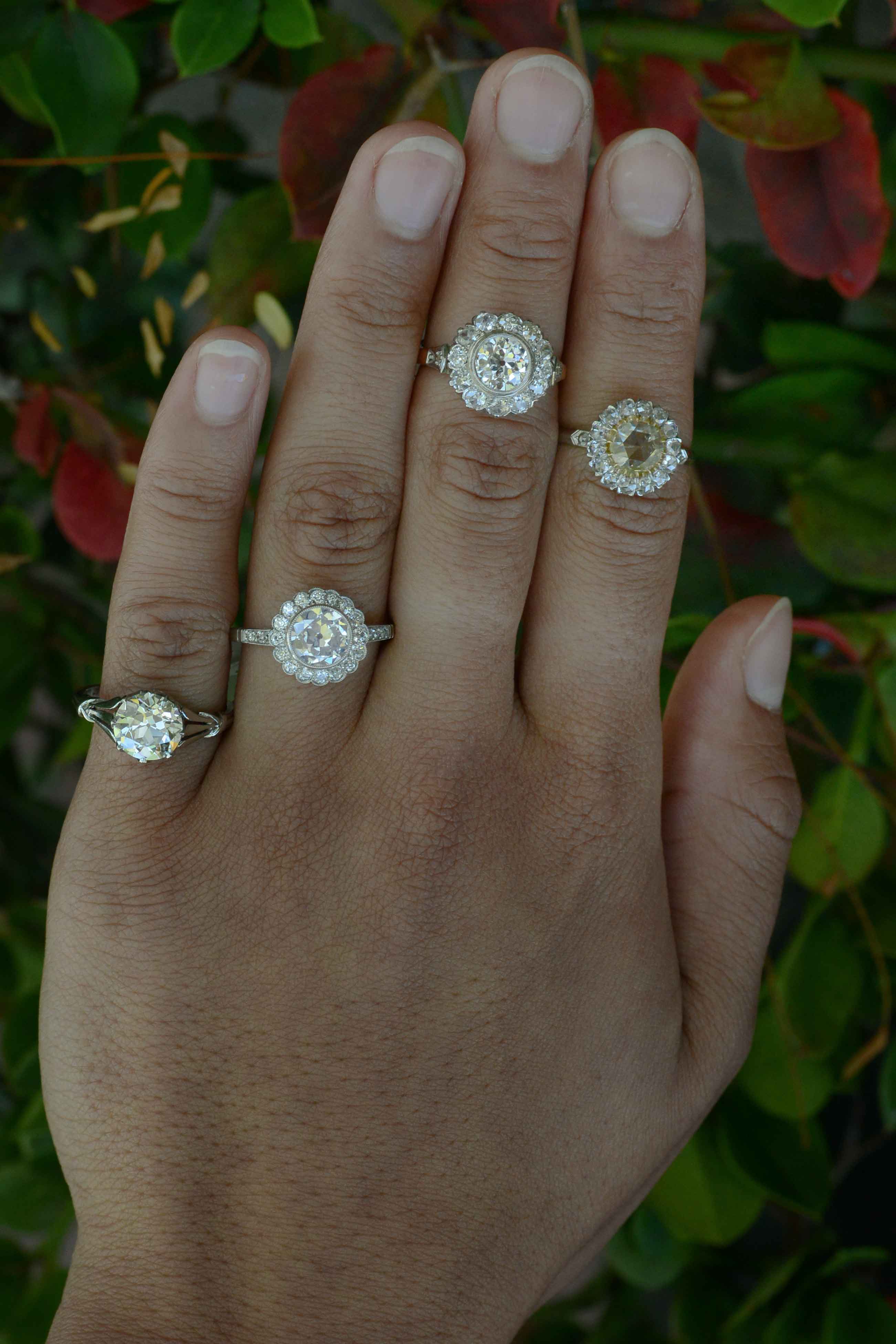 A selection of our floral diamond cluster engagement rings.