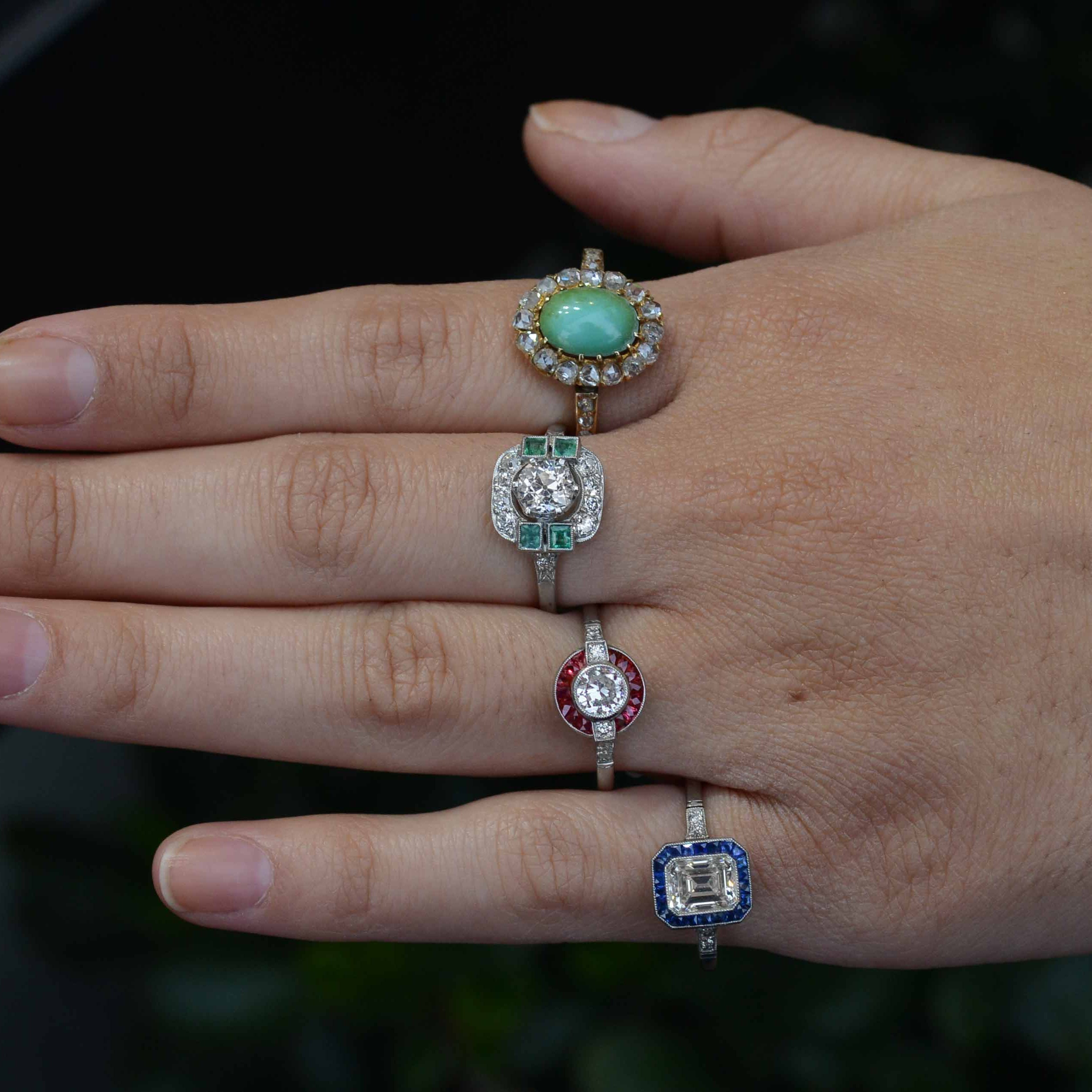 Diamond and gemstone halo engagement rings.