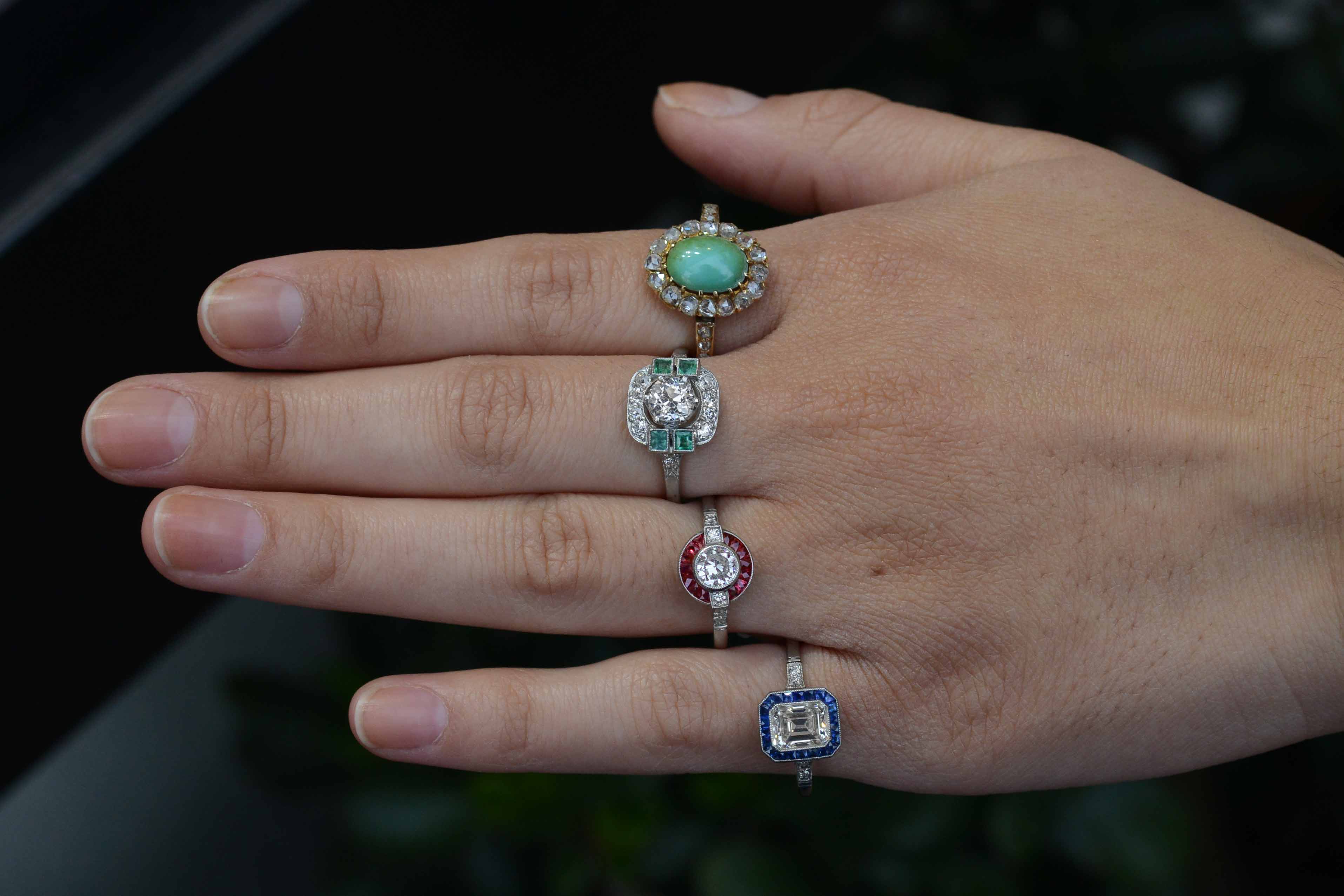 Diamond and gemstone halo engagement rings.