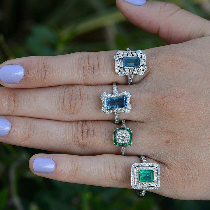 A unique collection of diamond and gemstone bulls eye wedding rings.