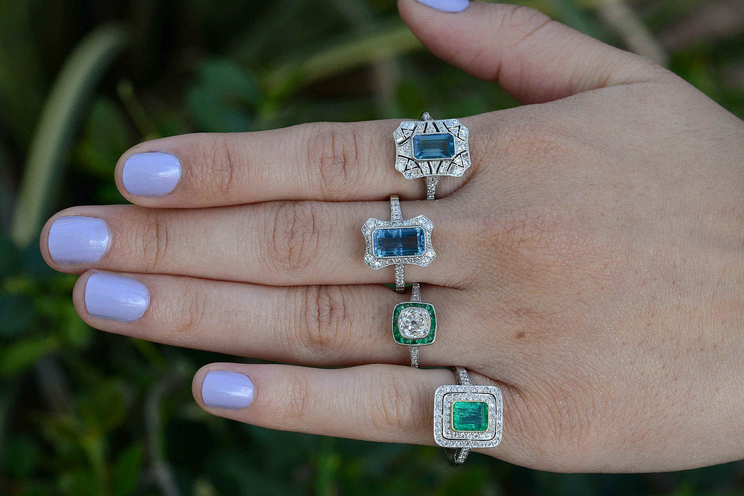 A unique collection of diamond and gemstone bulls eye wedding rings.