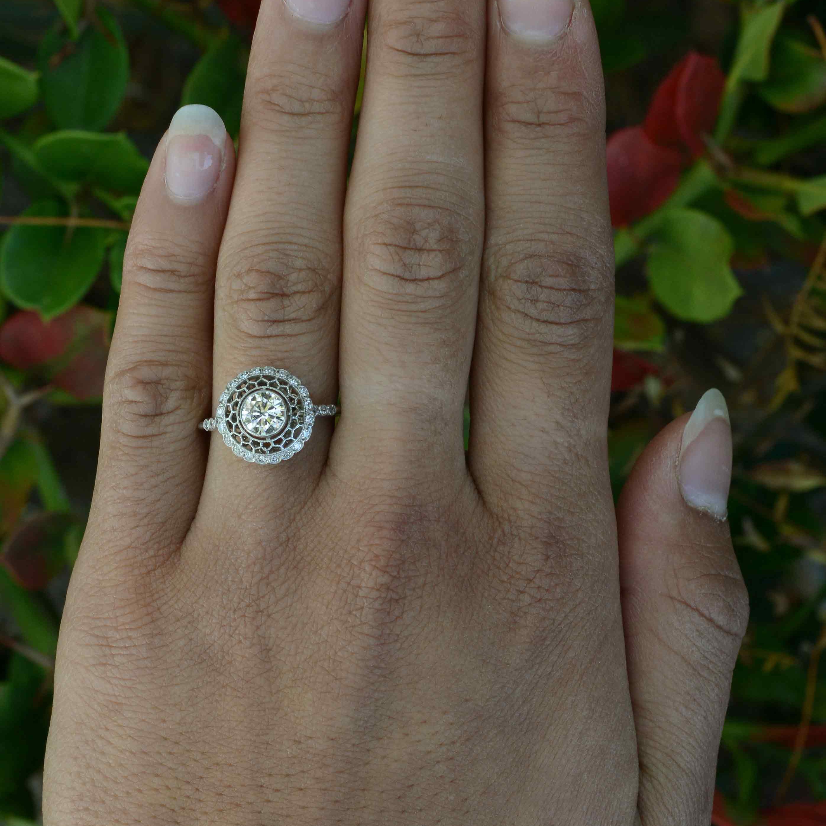 Snowflake diamond halo ring.