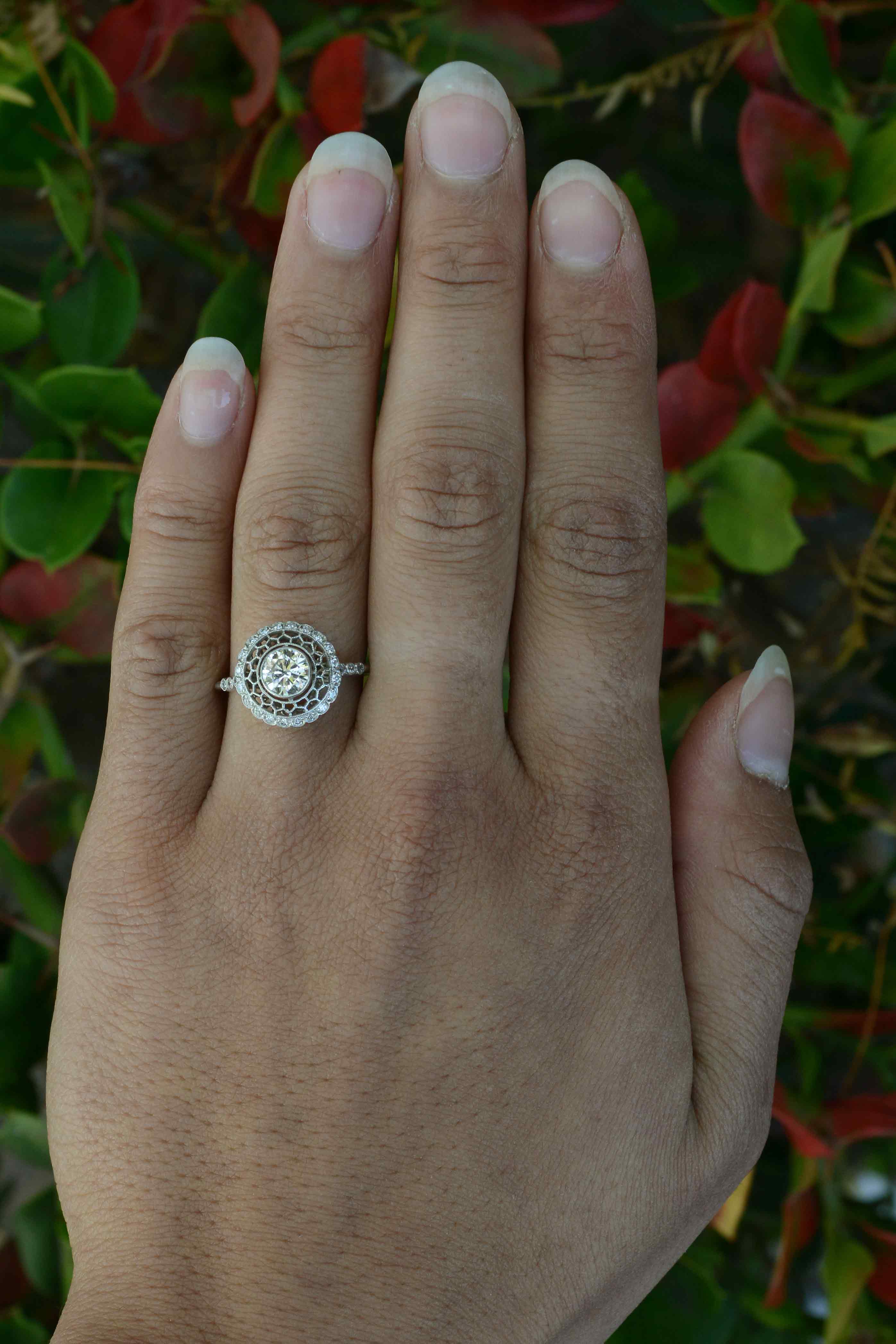 Snowflake diamond halo ring.