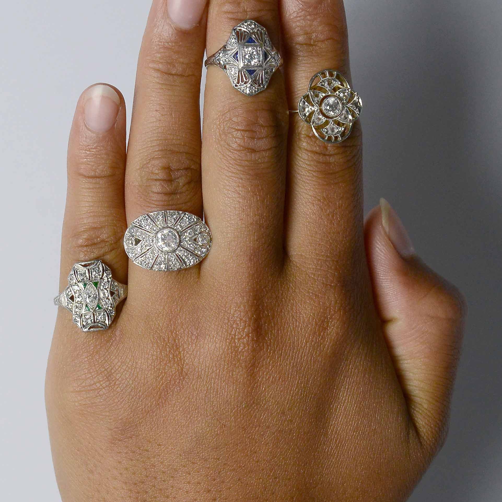 Diamond and platinum antique statement rings.