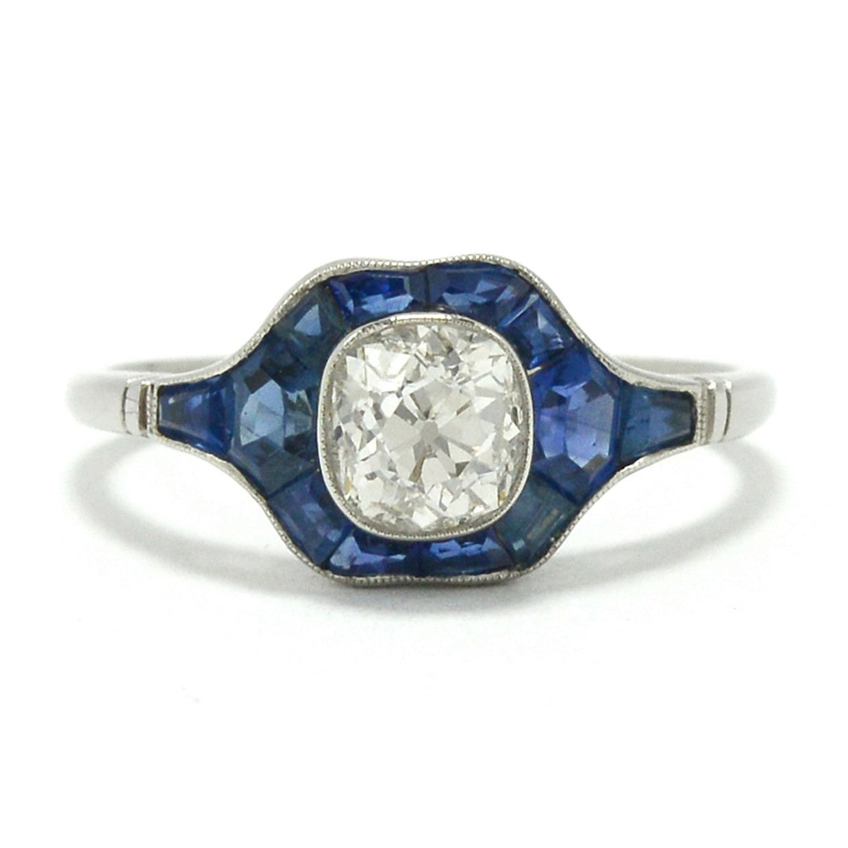 A unique, newly made antique cushion diamond engagement ring.