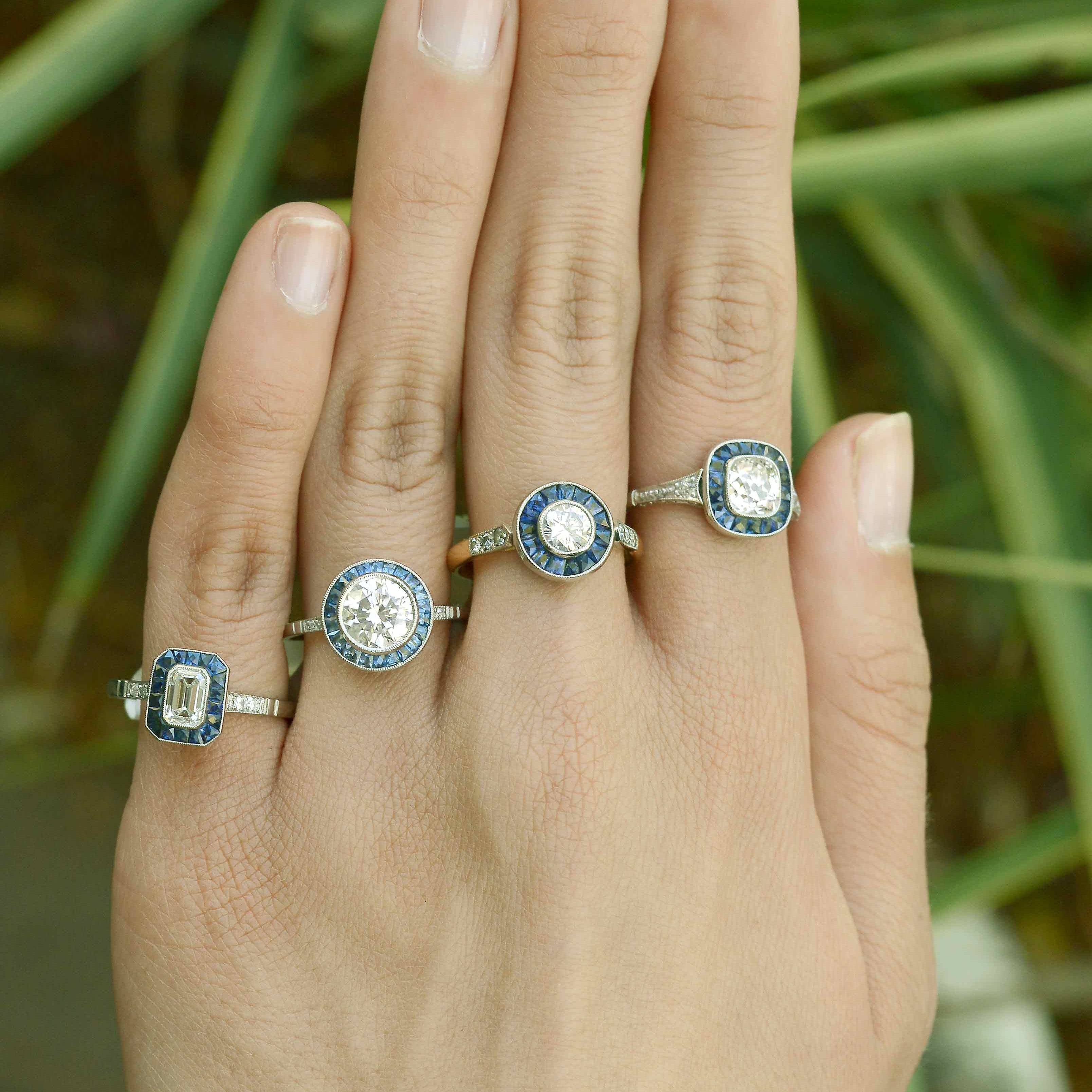 Old diamond and blue sapphire engagement rings.