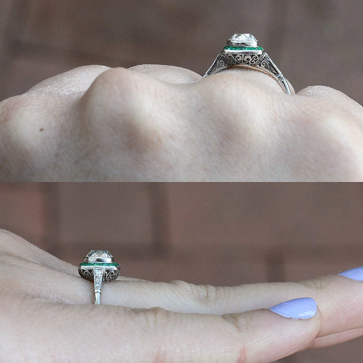 The cushion diamond has a little dome on top of this ring.