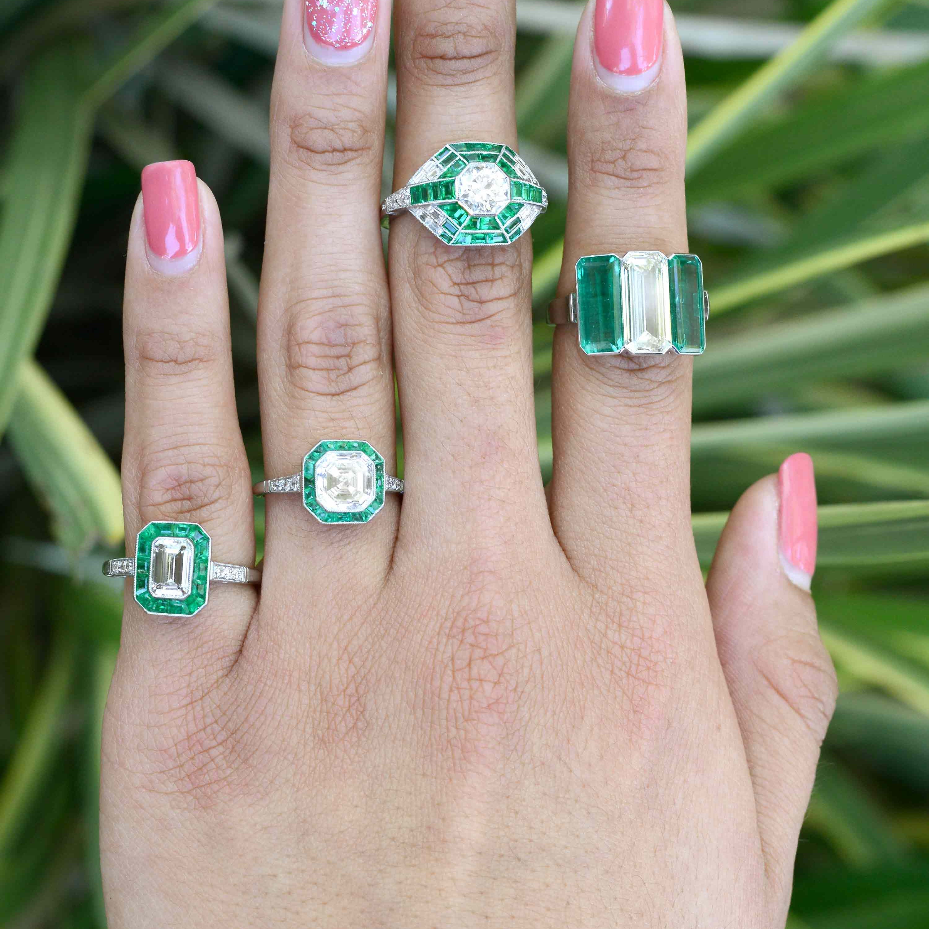 Some of our newly acquired diamond and emerald platinum wedding rings.