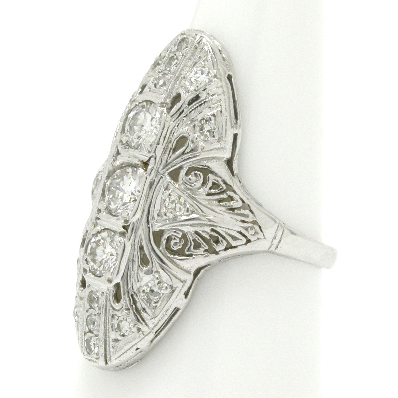 Dinner style diamonds filigree ring.