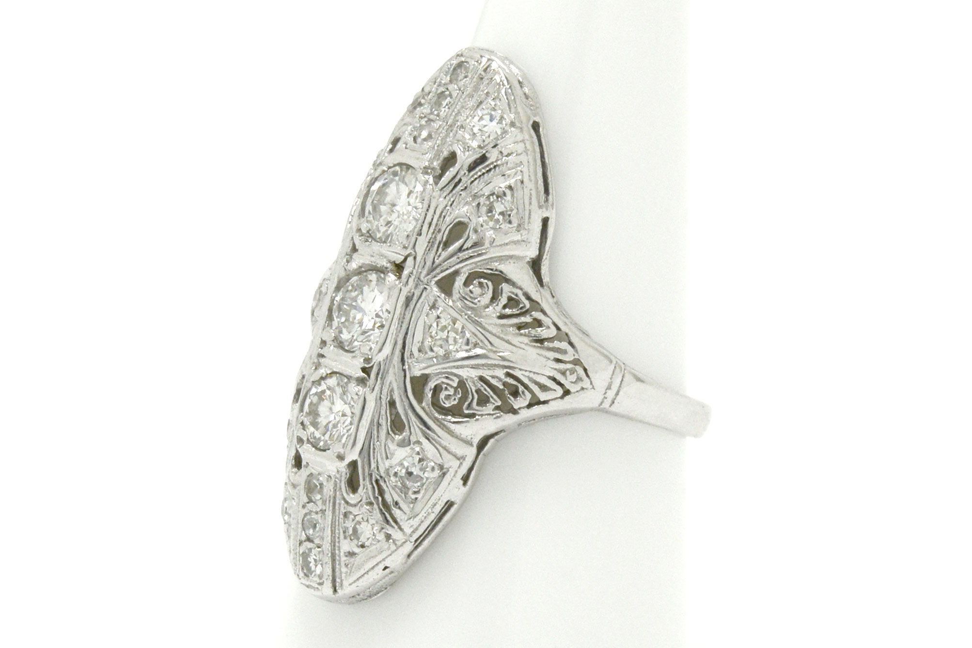 Dinner style diamonds filigree ring.