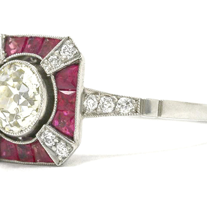 An Art Deco inspired diamonds and rubies x design engagement ring.