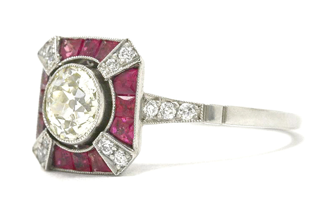 An Art Deco inspired diamonds and rubies x design engagement ring.