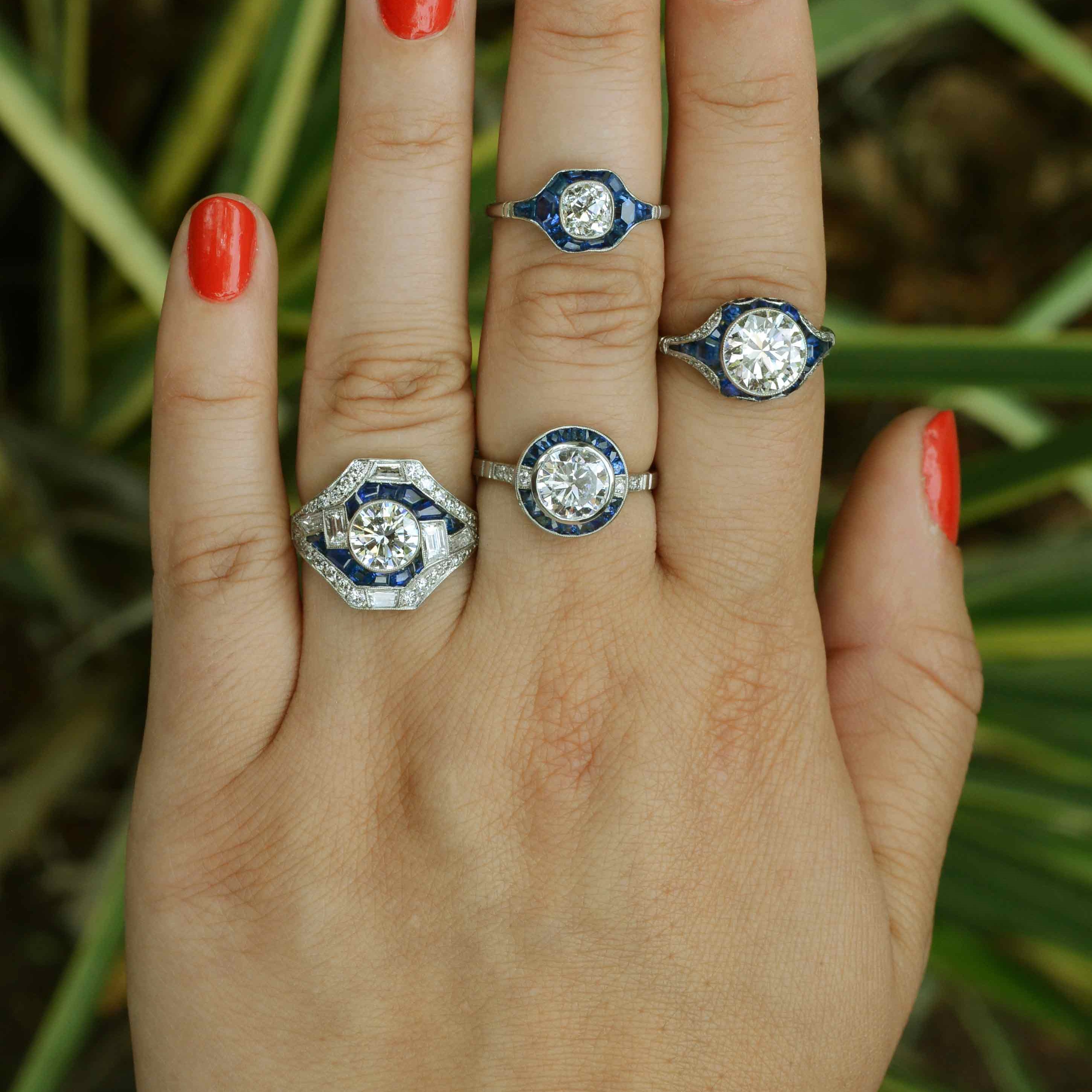 Some of our diamond & blue sapphire engagement rings from different eras.