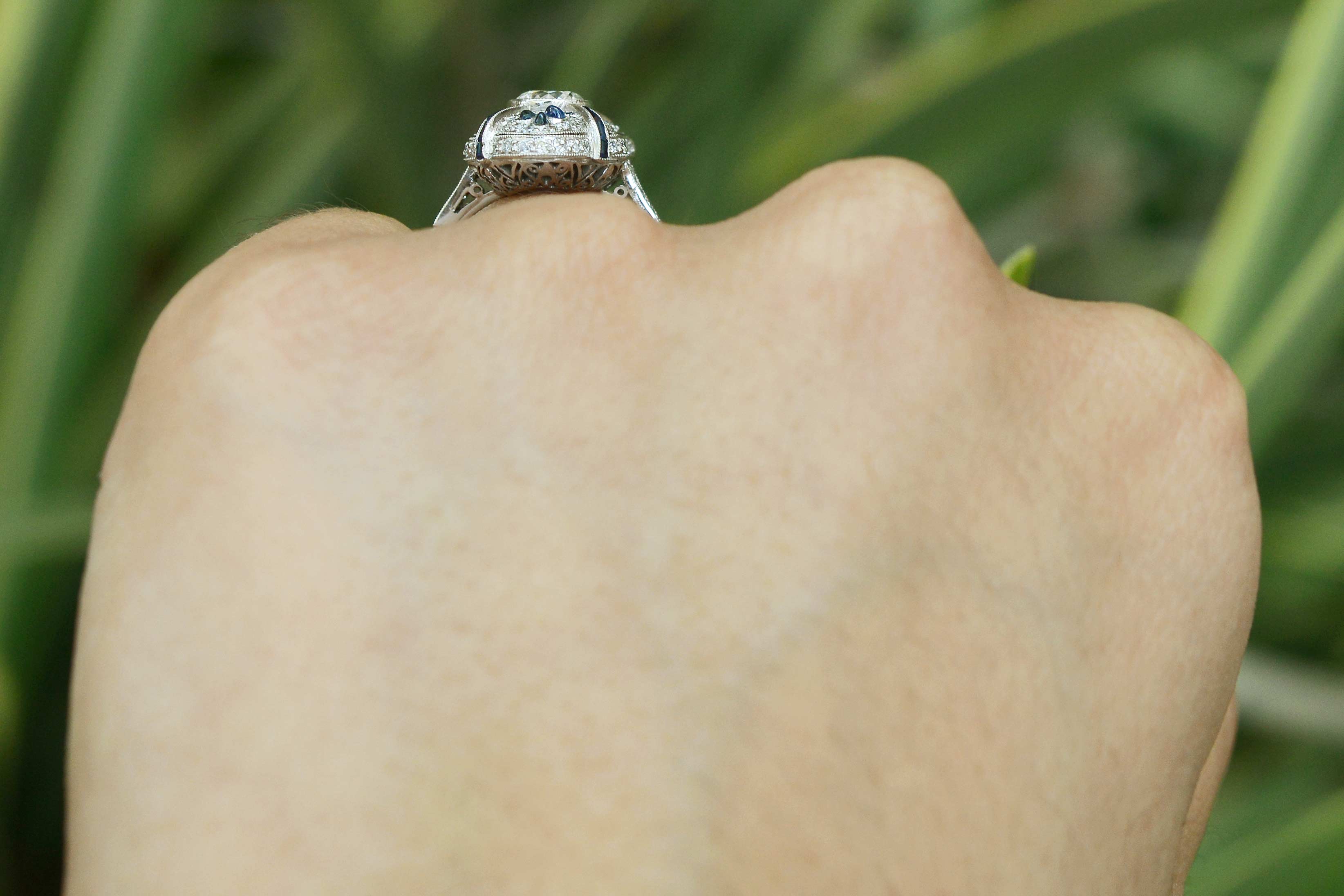 Water droplet shaped blue sapphires accent this stunning platinum statement ring.