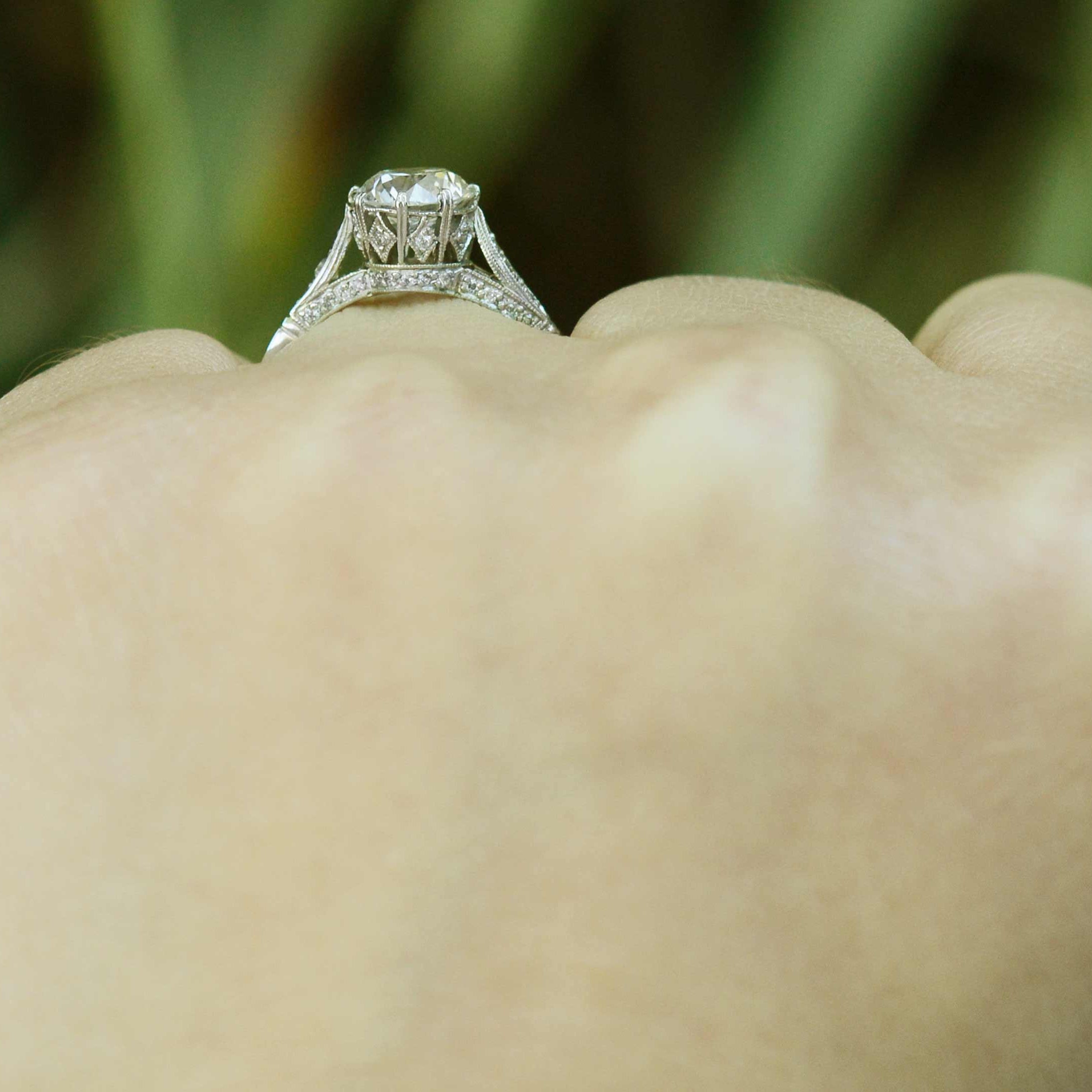 This diamond wedding ring is a 19th century solitaire style design recreated.
