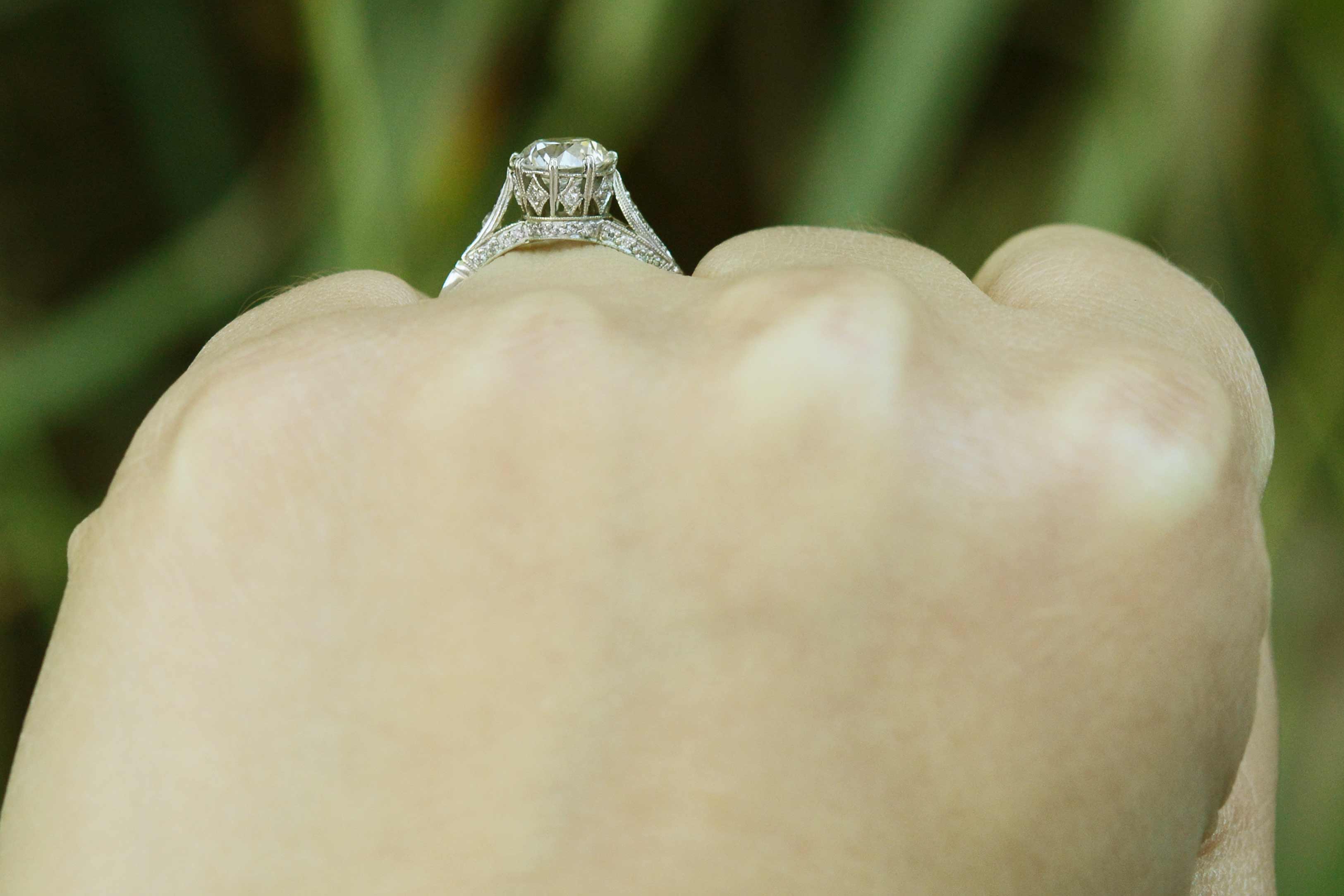 This diamond wedding ring is a 19th century solitaire style design recreated.