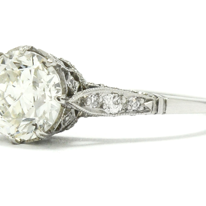 An 8 prong setting, platinum Edwardian style diamond engagement ring.