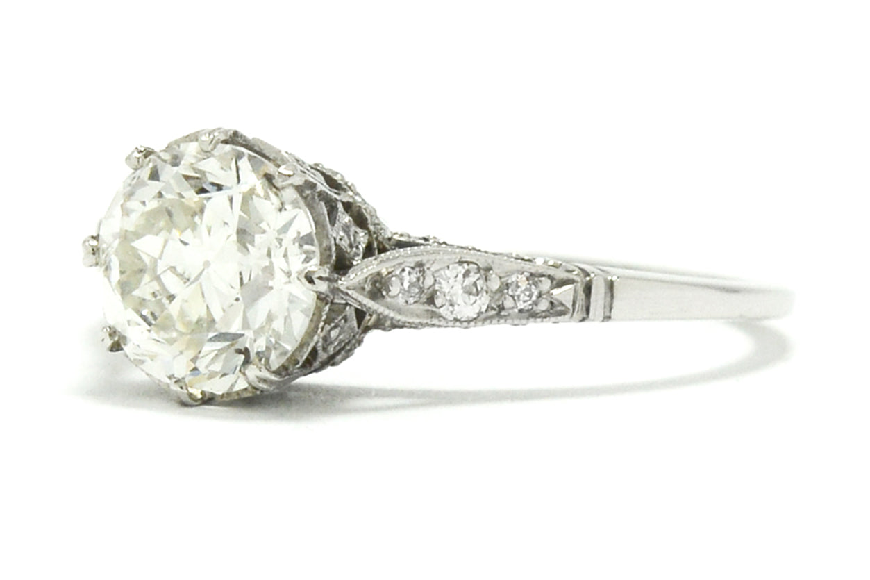 An 8 prong setting, platinum Edwardian style diamond engagement ring.