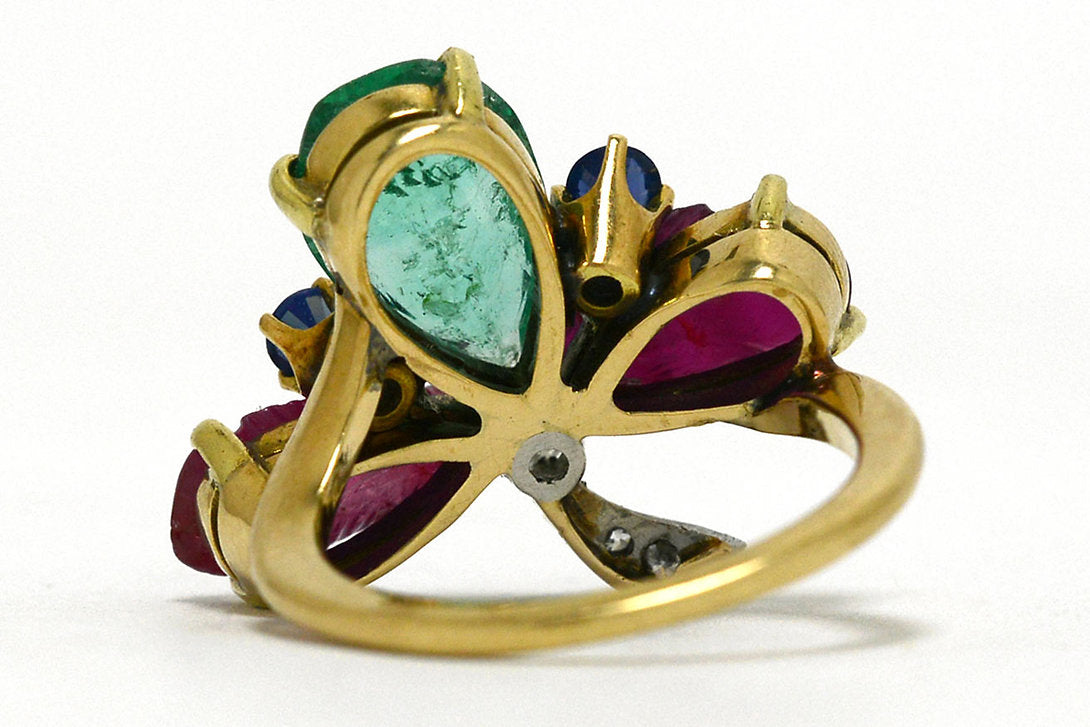 4 different gemstone line this 3 leaf clover ring.