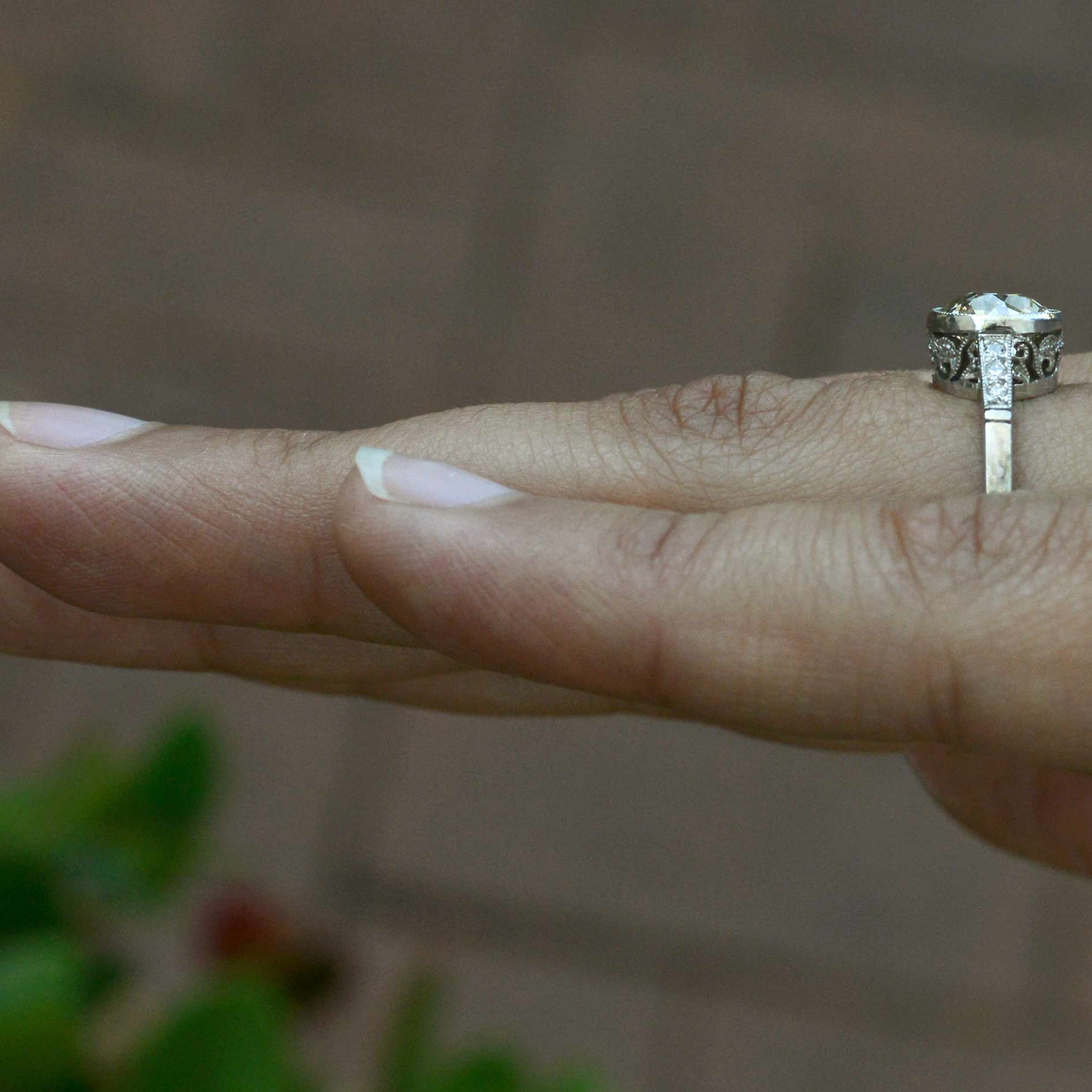 A look at the milgrain diamond bezel setting of this solitaire.