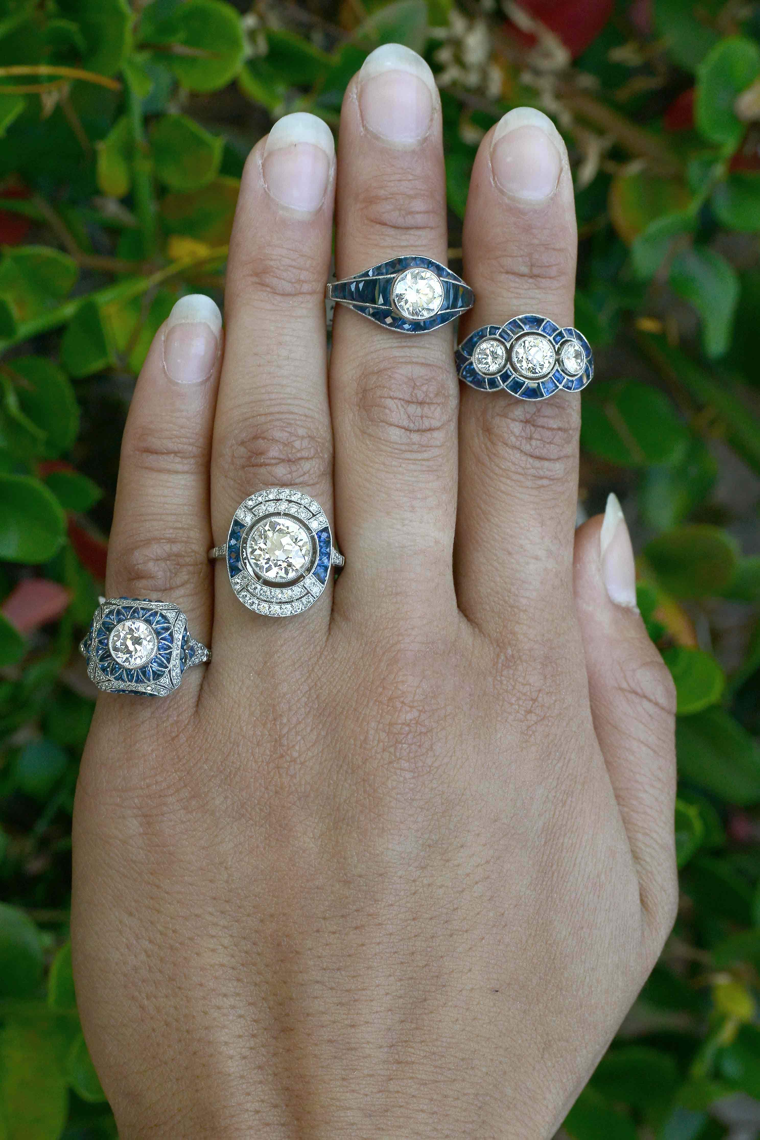 A collection of diamond and sapphire cocktail and bridal rings.