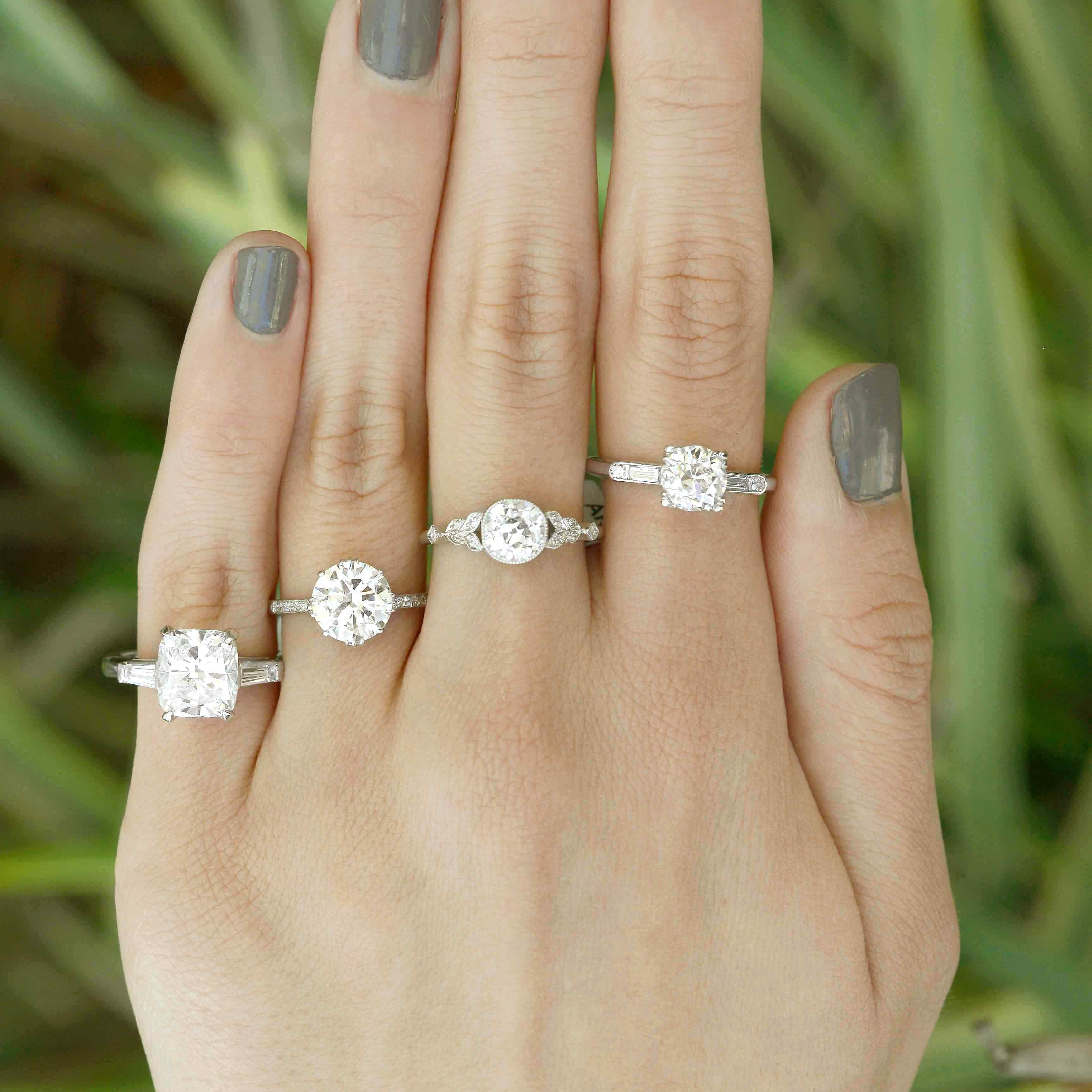 Round diamond platinum solitaire engagement rings.