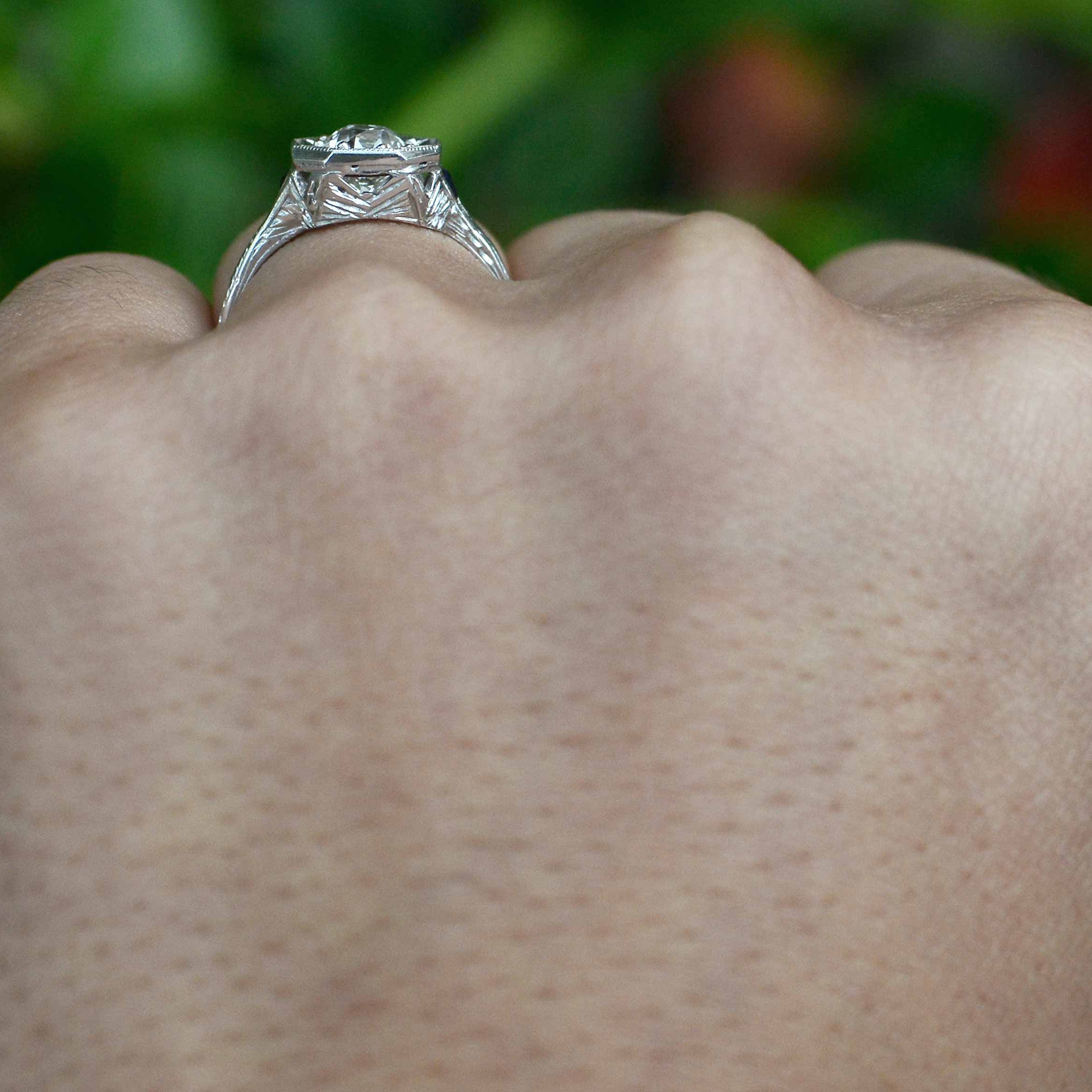 An octagon 3 stone Art Deco engagement ring.