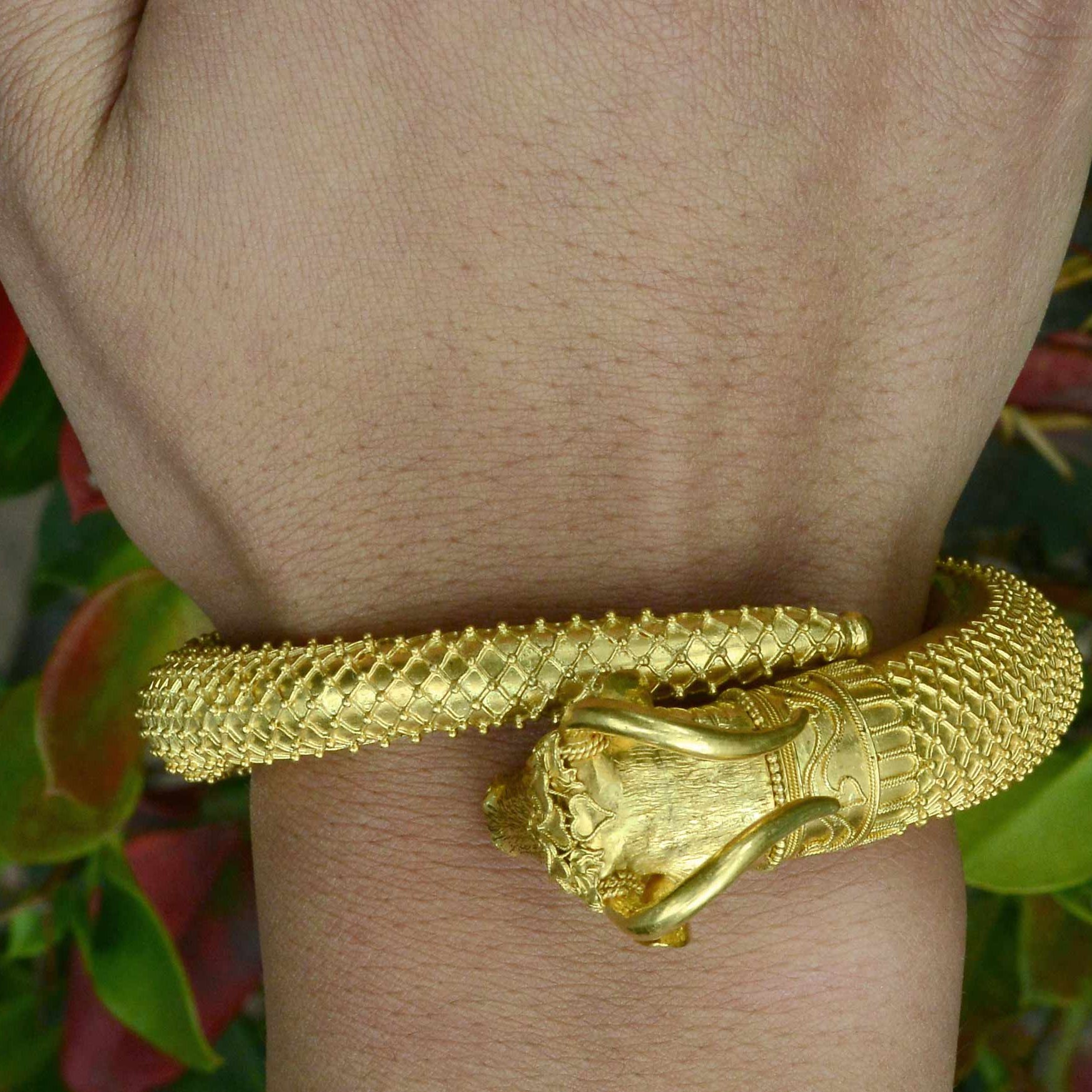 An Etruscan style, heavy heirloom gold bracelet.
