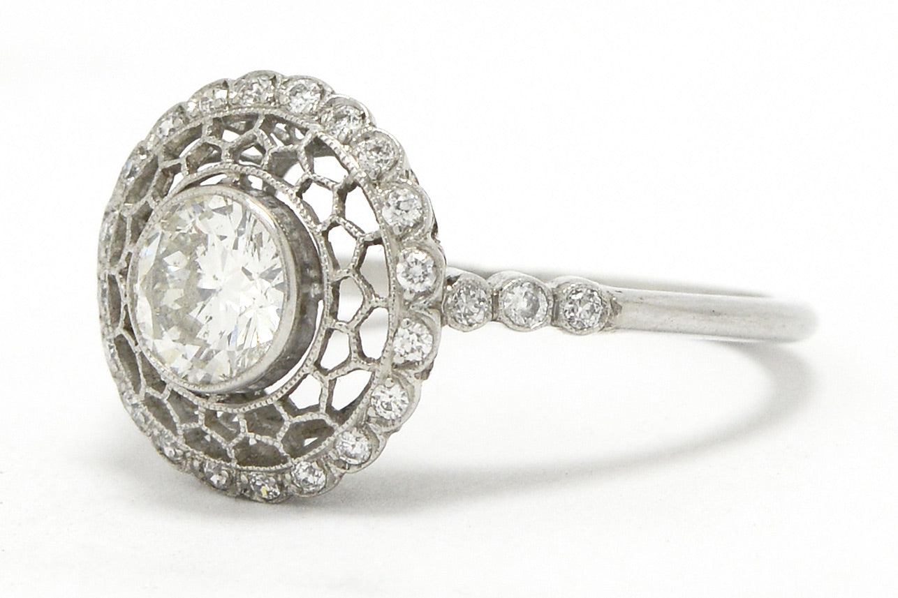 Unique lace filigree diamond engagement ring.