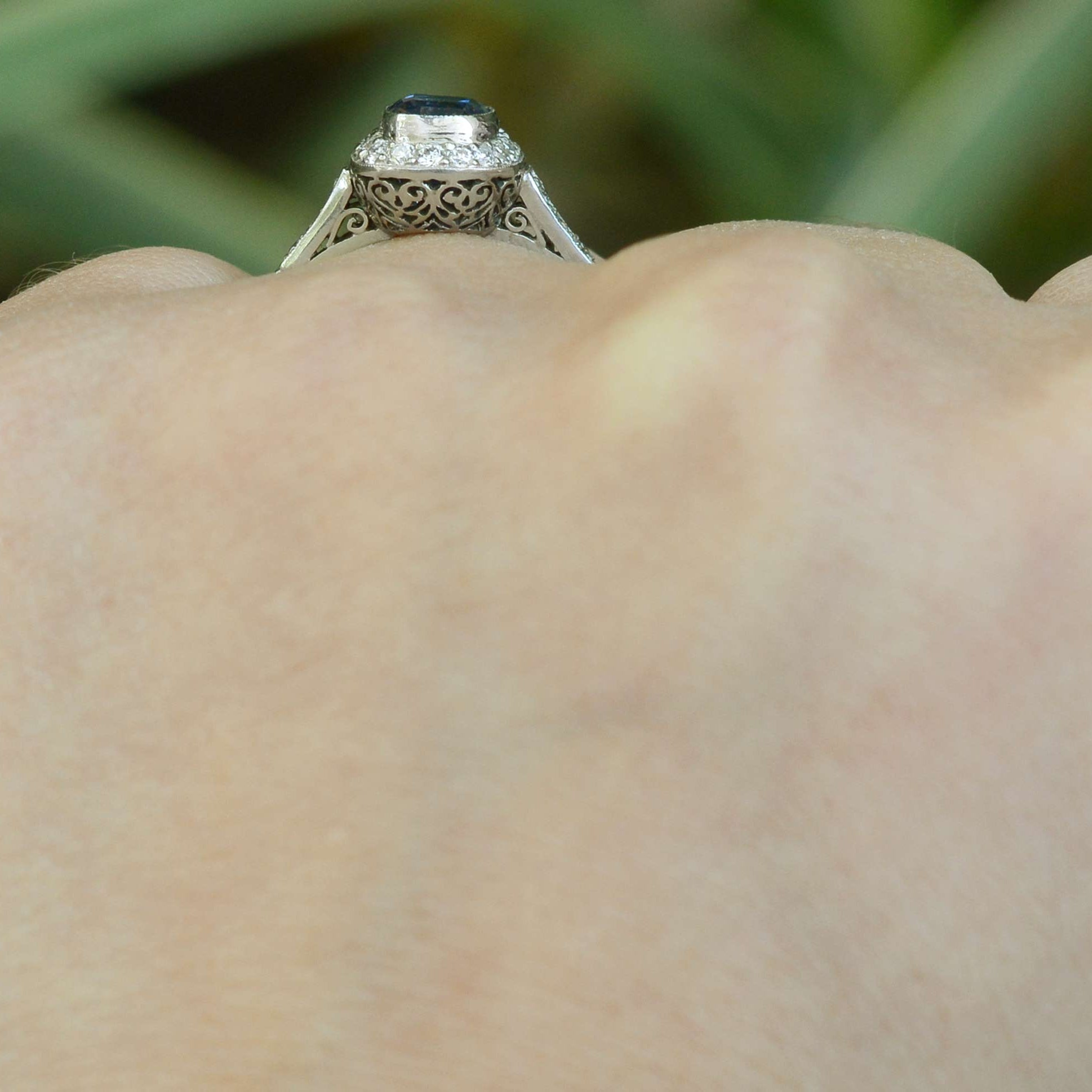 This low setting ring has impressive filigree and scroll work in the under gallery.