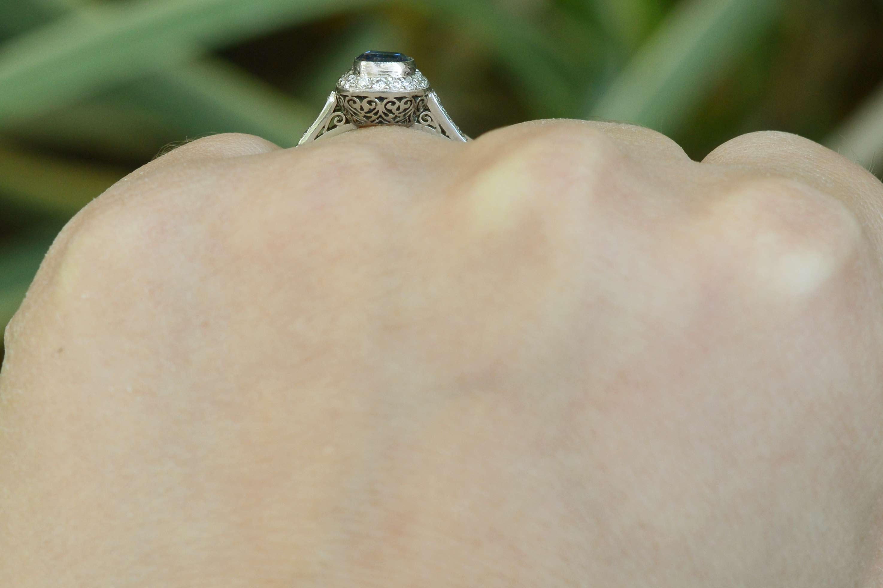 This low setting ring has impressive filigree and scroll work in the under gallery.