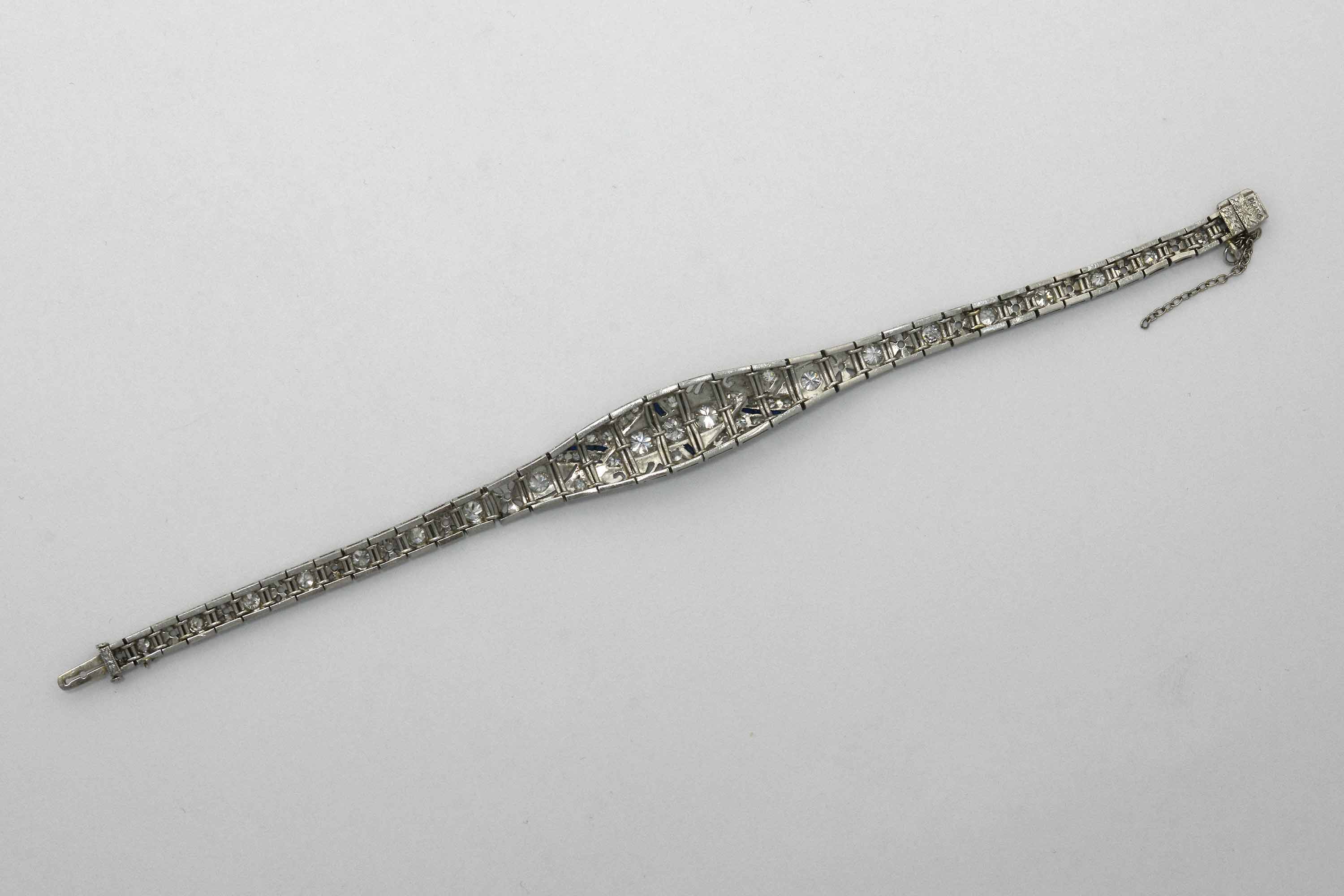 An Art Deco geometric design, filigree link bracelet with diamonds.