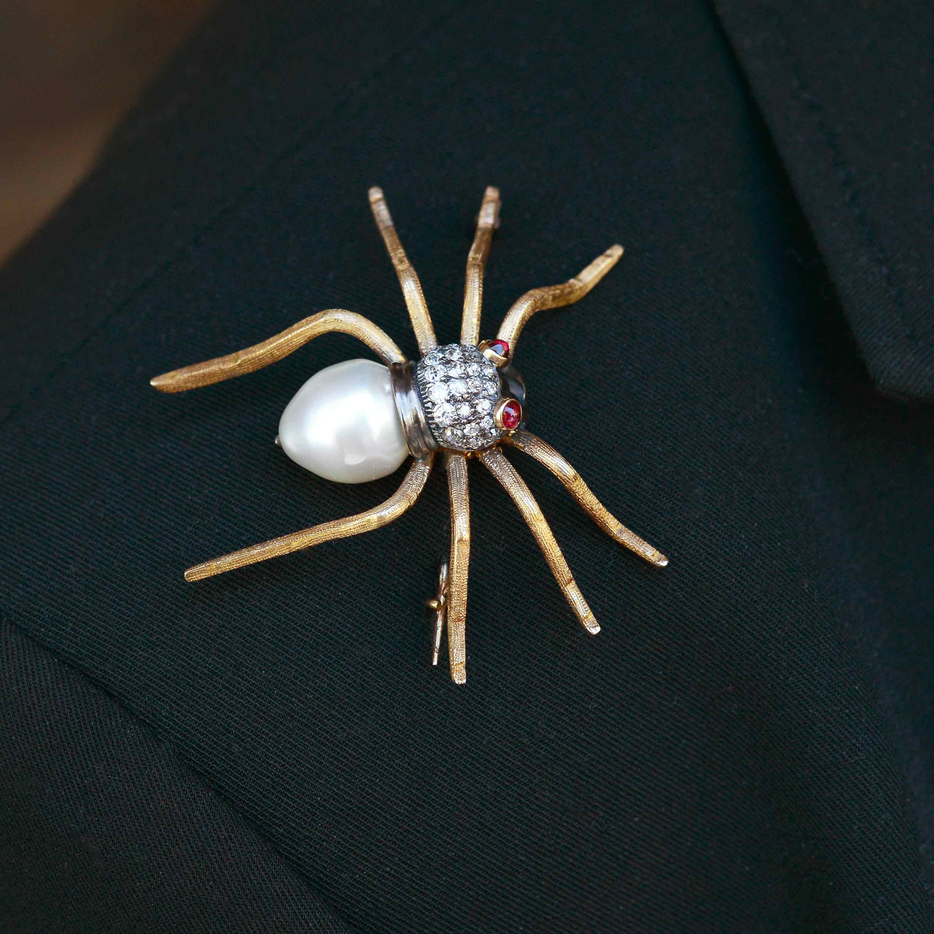 A giant diamonds and pearl tarantula pin.