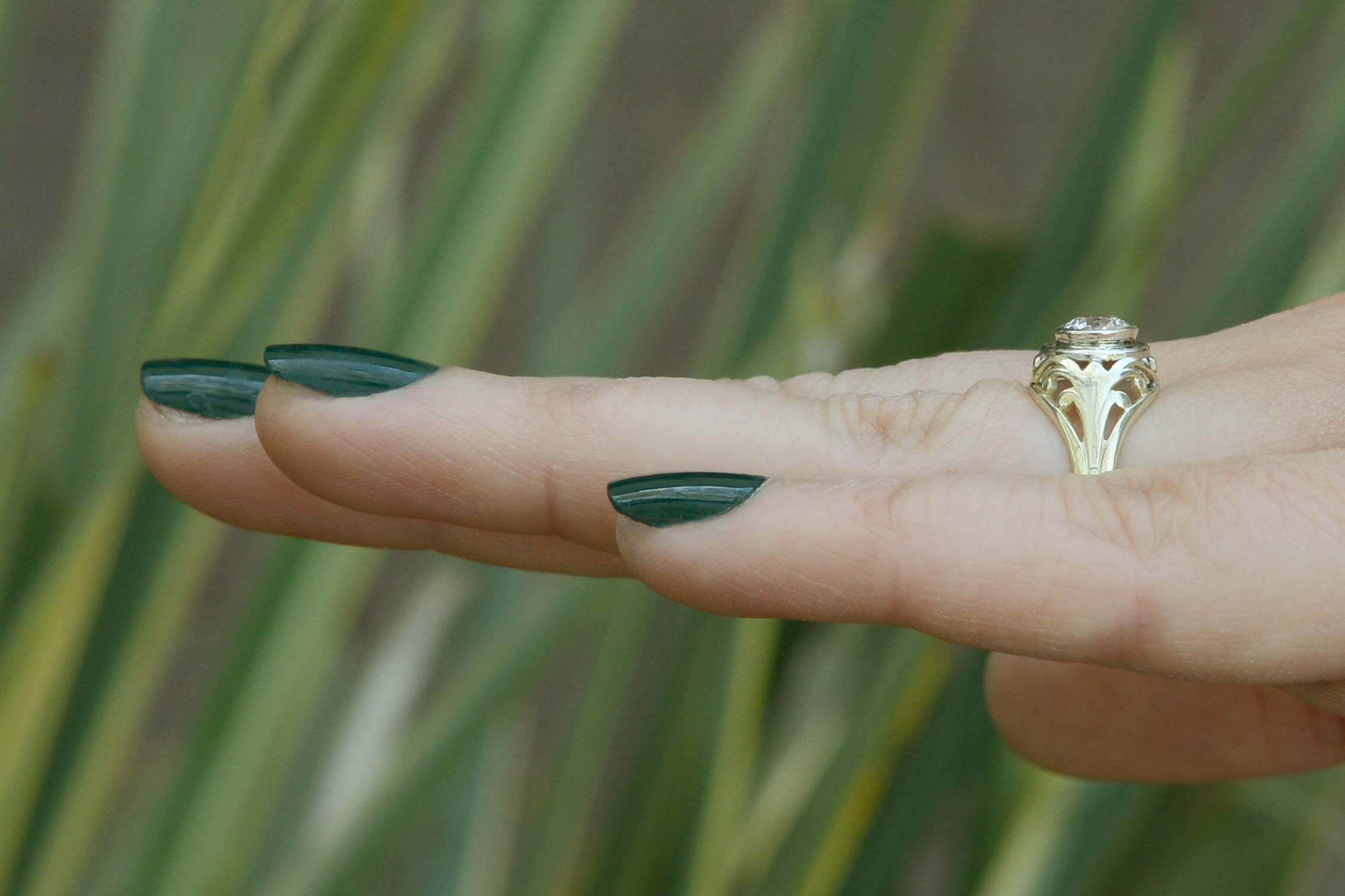 A size 6 1/2 Art Nouveau antique yellow gold engagement ring.