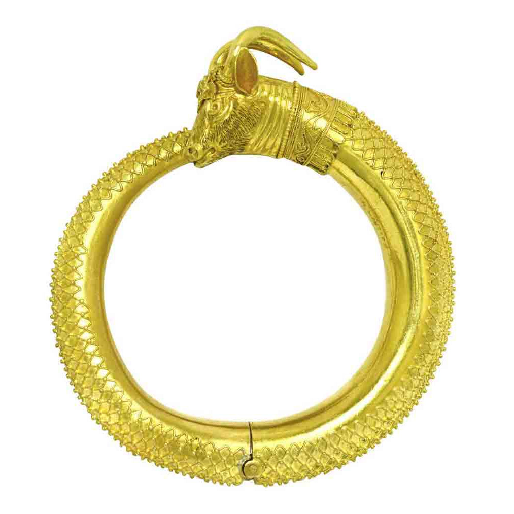 A hand fabricated Victorian Etruscan revival ram head bangle bracelet.