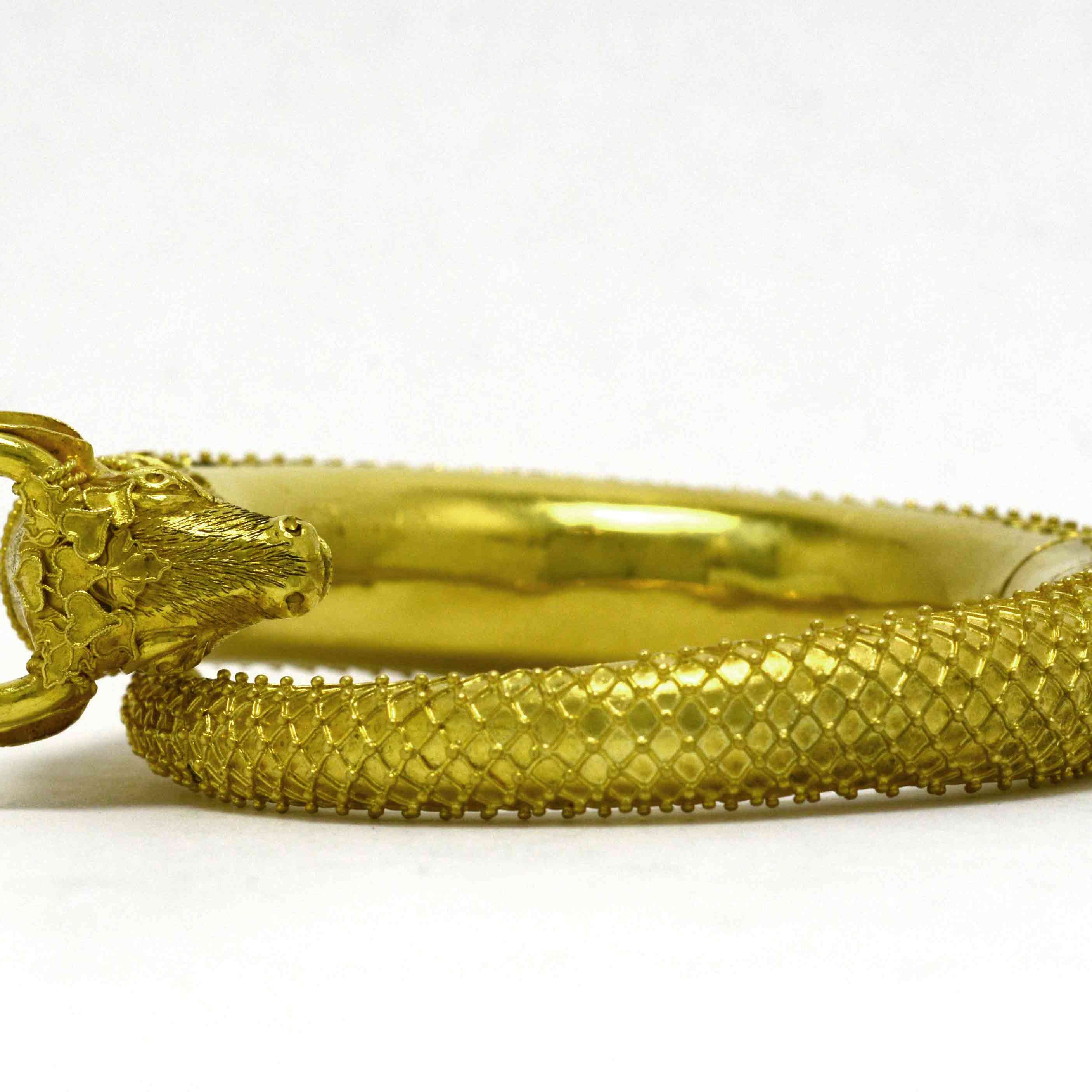 An early 1900s, Victorian animal themed gold 7" bracelet.