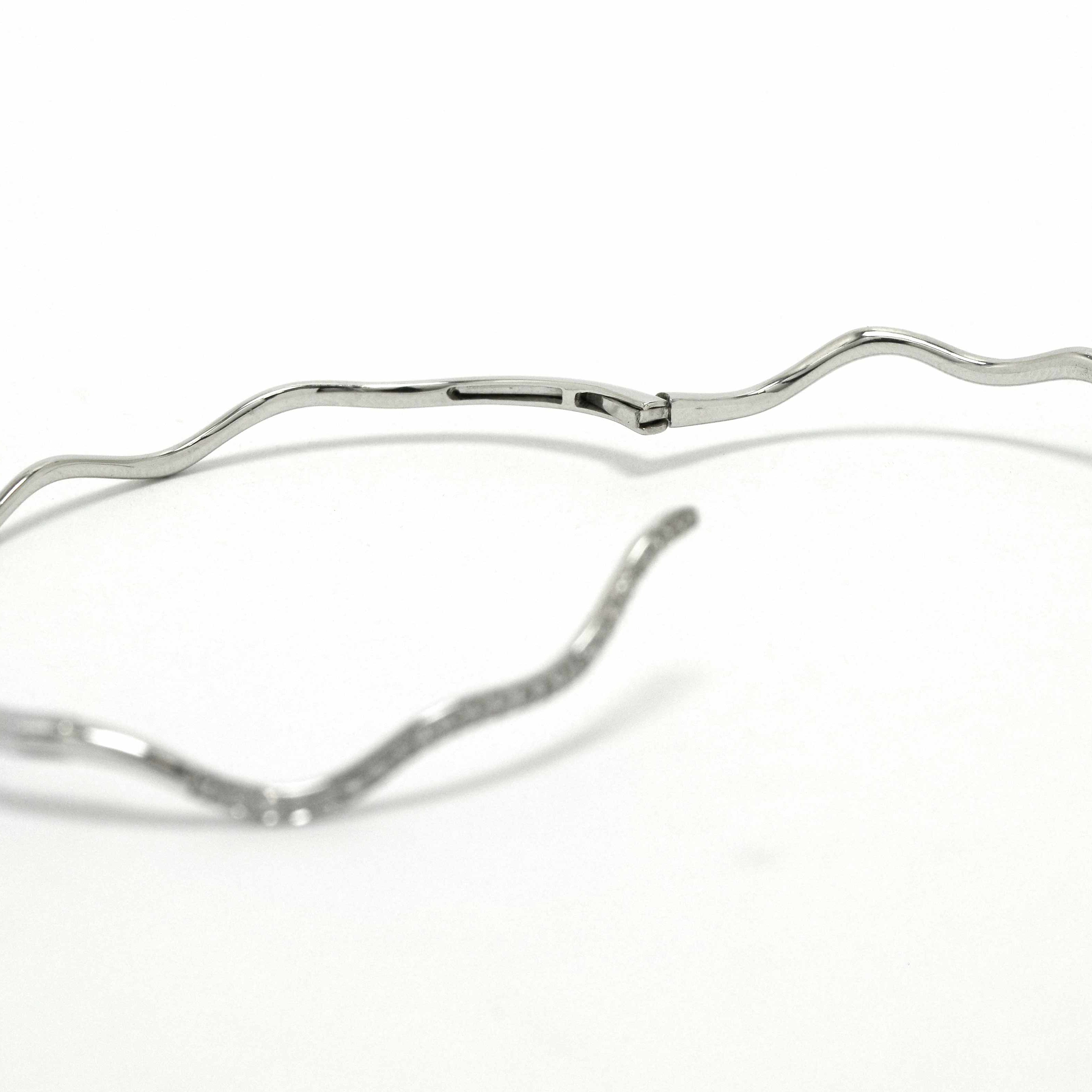 A hinged thin snake bracelet.