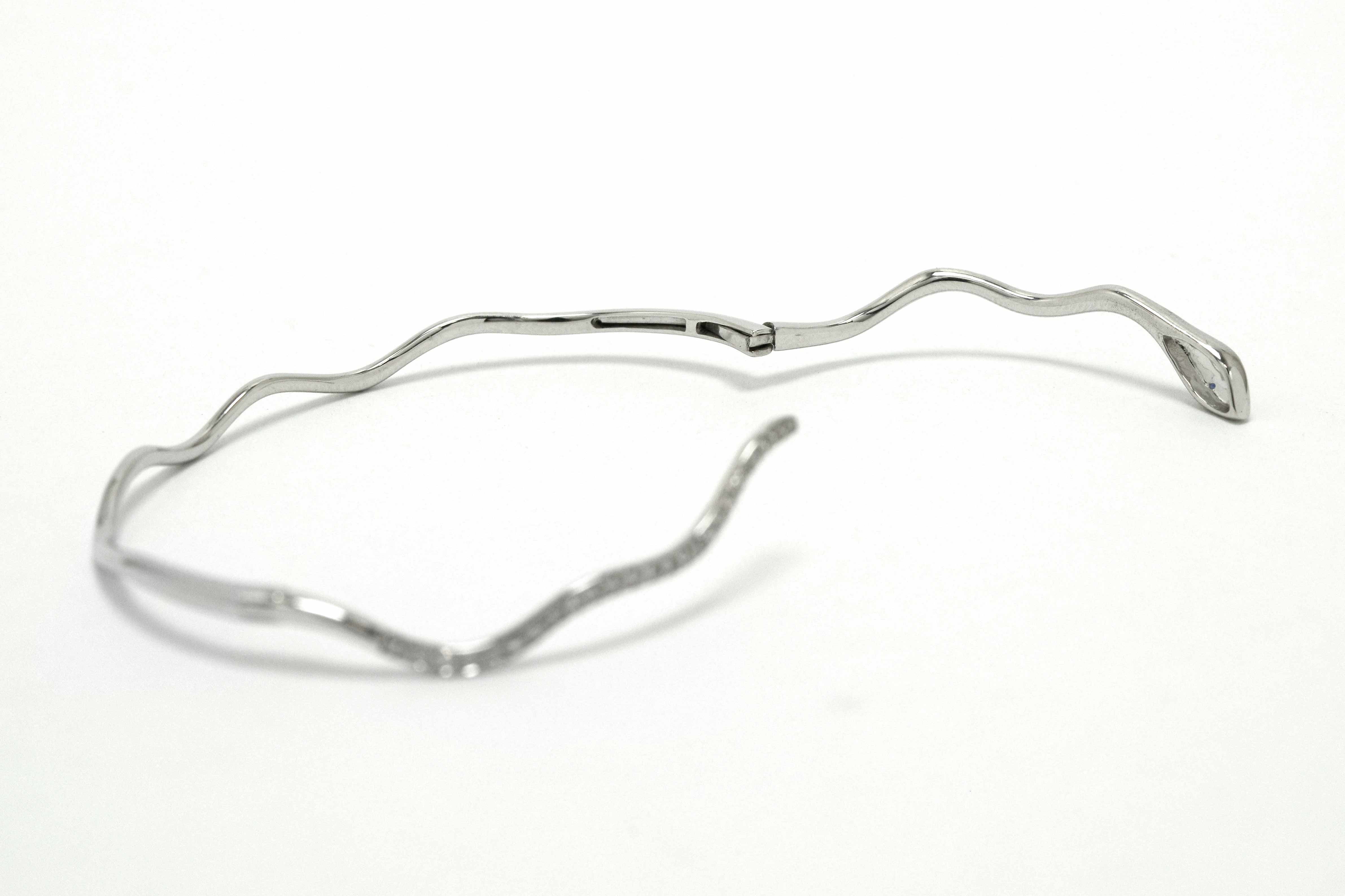 A hinged thin snake bracelet.