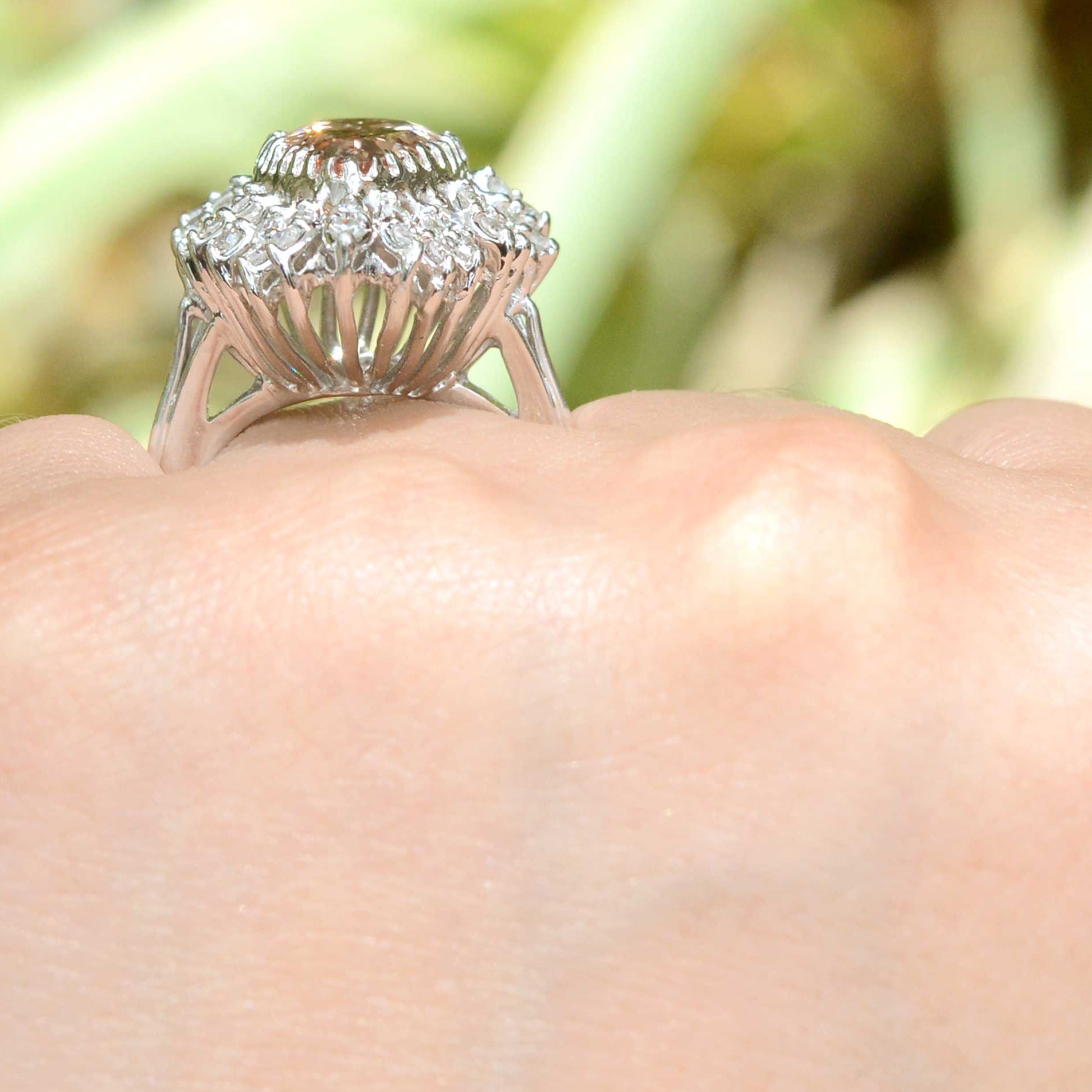 A five carat pear cut morganite ring set in a 14k white gold setting.