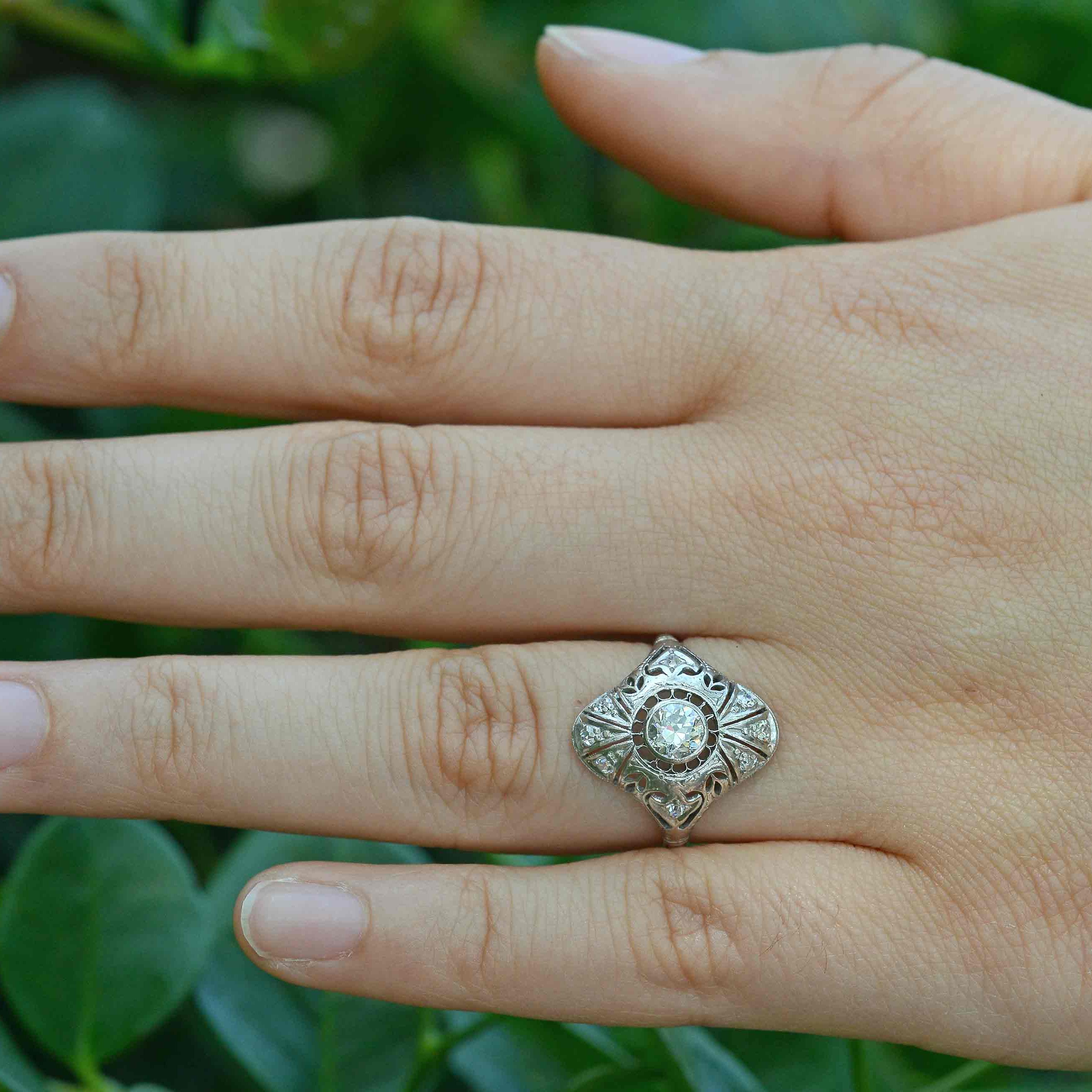 A diamonds shield antique engagement ring