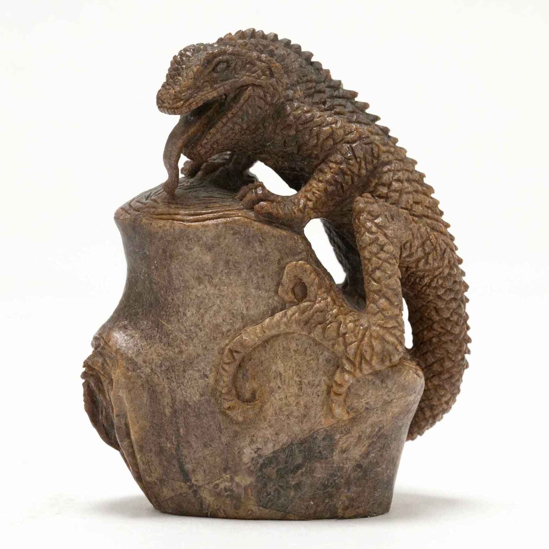 A long tongue lizard carved from a nice specimen of Gaviota whale bone.