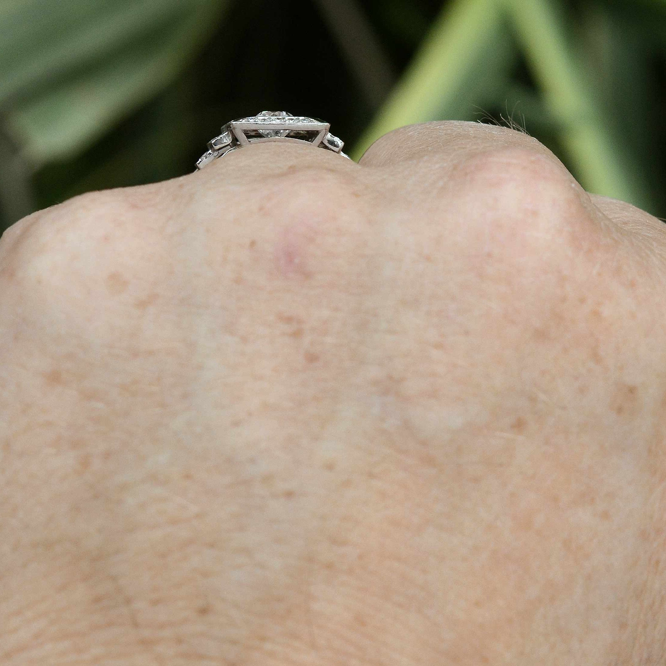 A tiered shank diamonds enamel wedding ring.