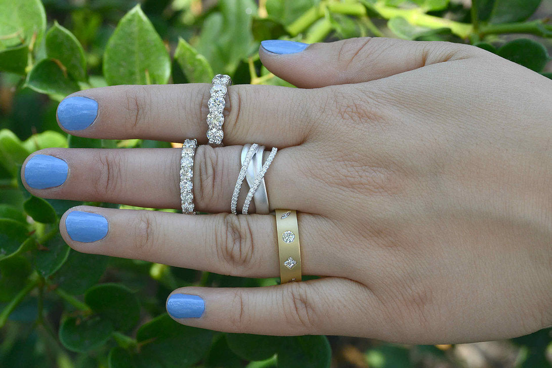 A collection of unique modern diamond bands.