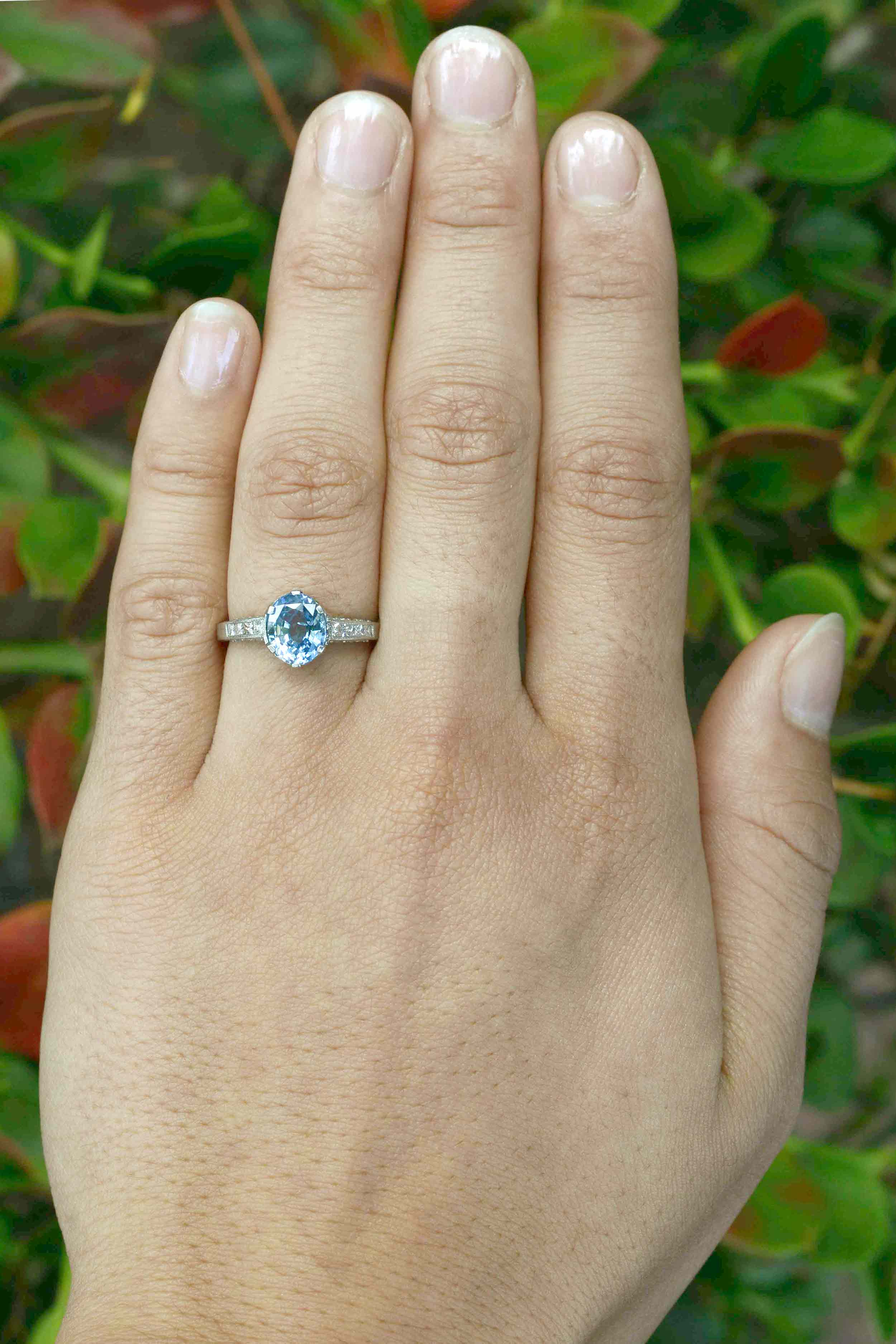 A single blue ceylon sapphire is supported by 6 prongs.