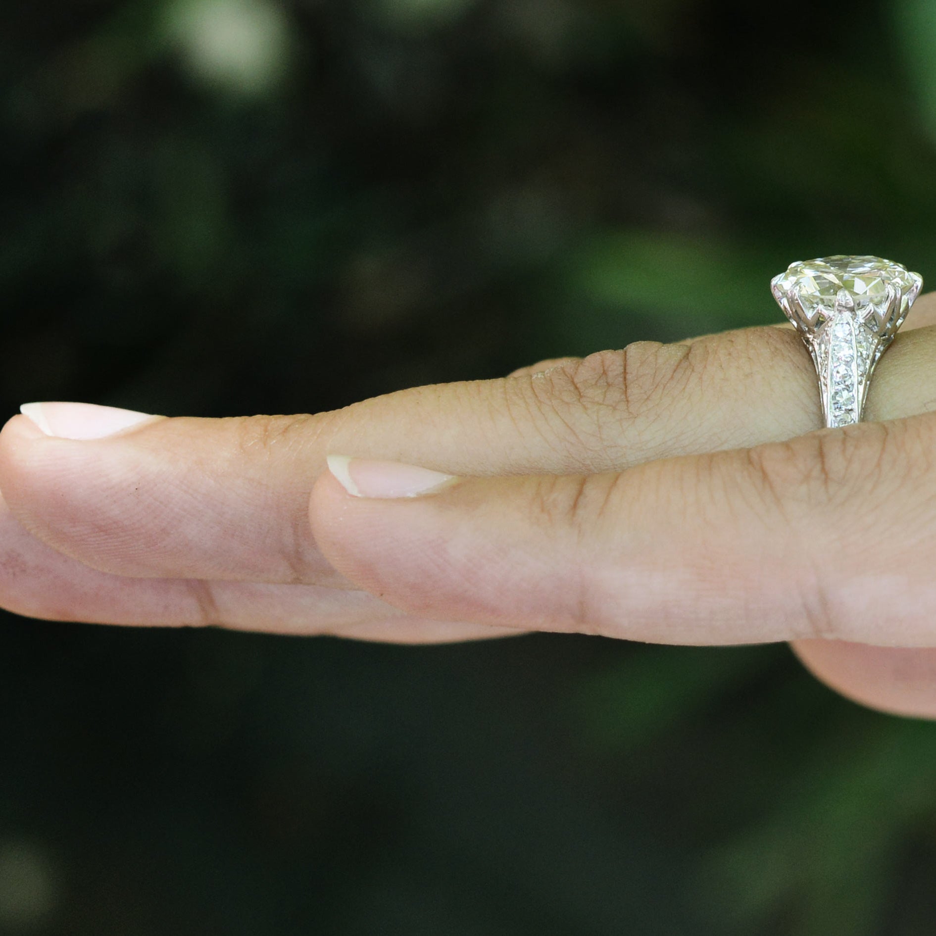 Edwardian four carat diamond solitaire wedding ring.