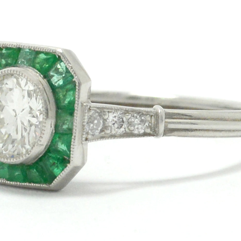 An octagon diamond emerald target Art Deco engagement ring.