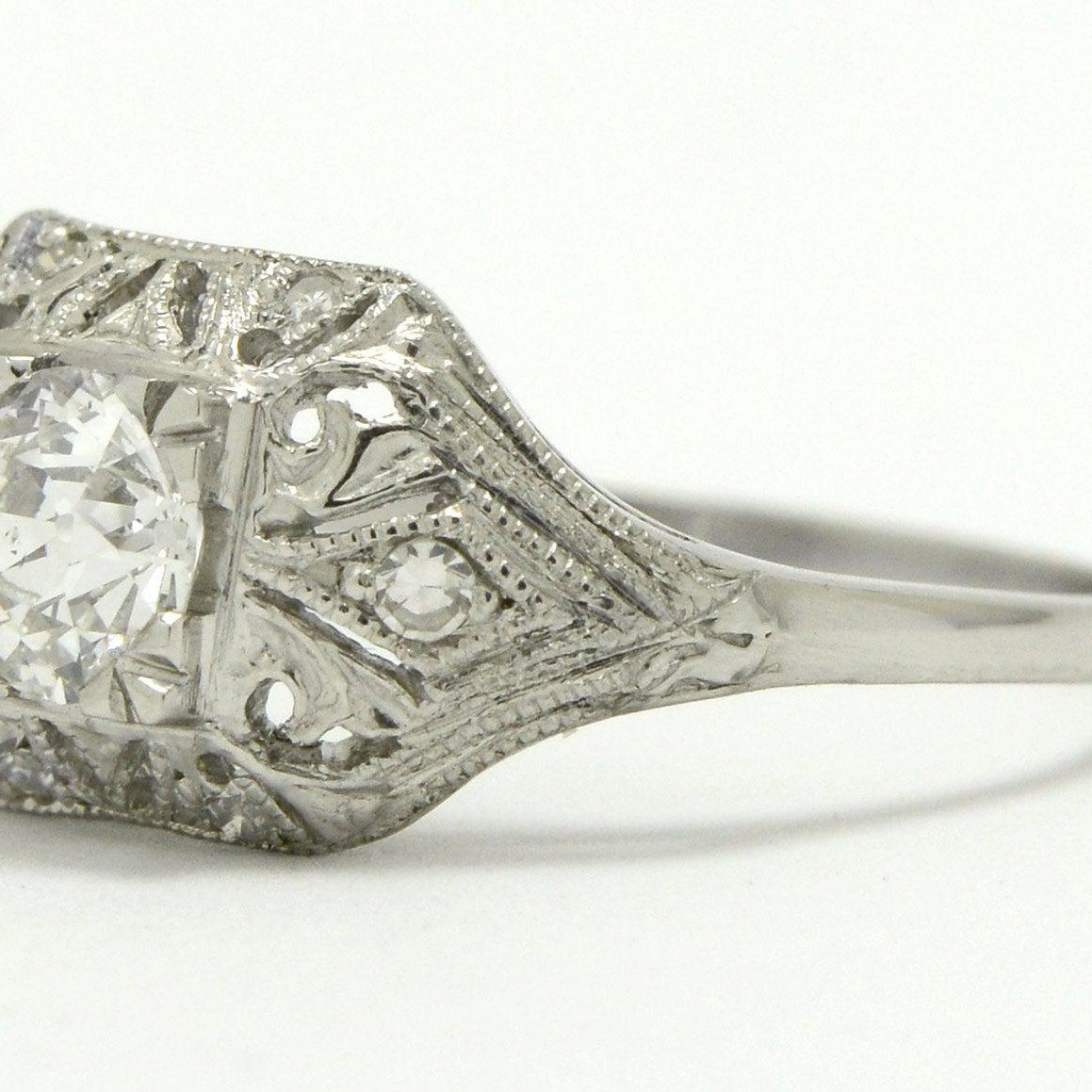 Rounded rectangle diamonds wedding ring.