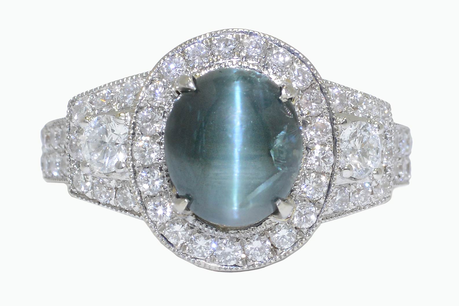 This engagement ring features a rare, color changing alexandrite gemstone.