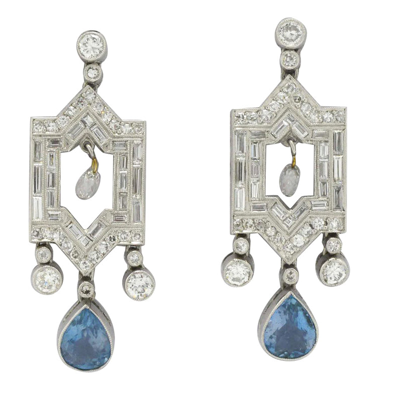 2 carats of glimmering round and baguette diamonds earrings.