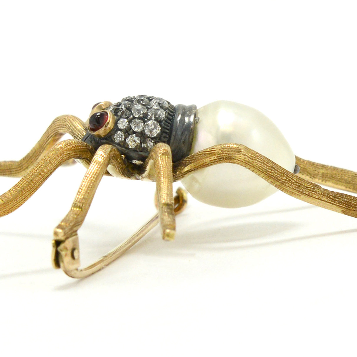 A late 1800s Victorian pearl diamond spider.